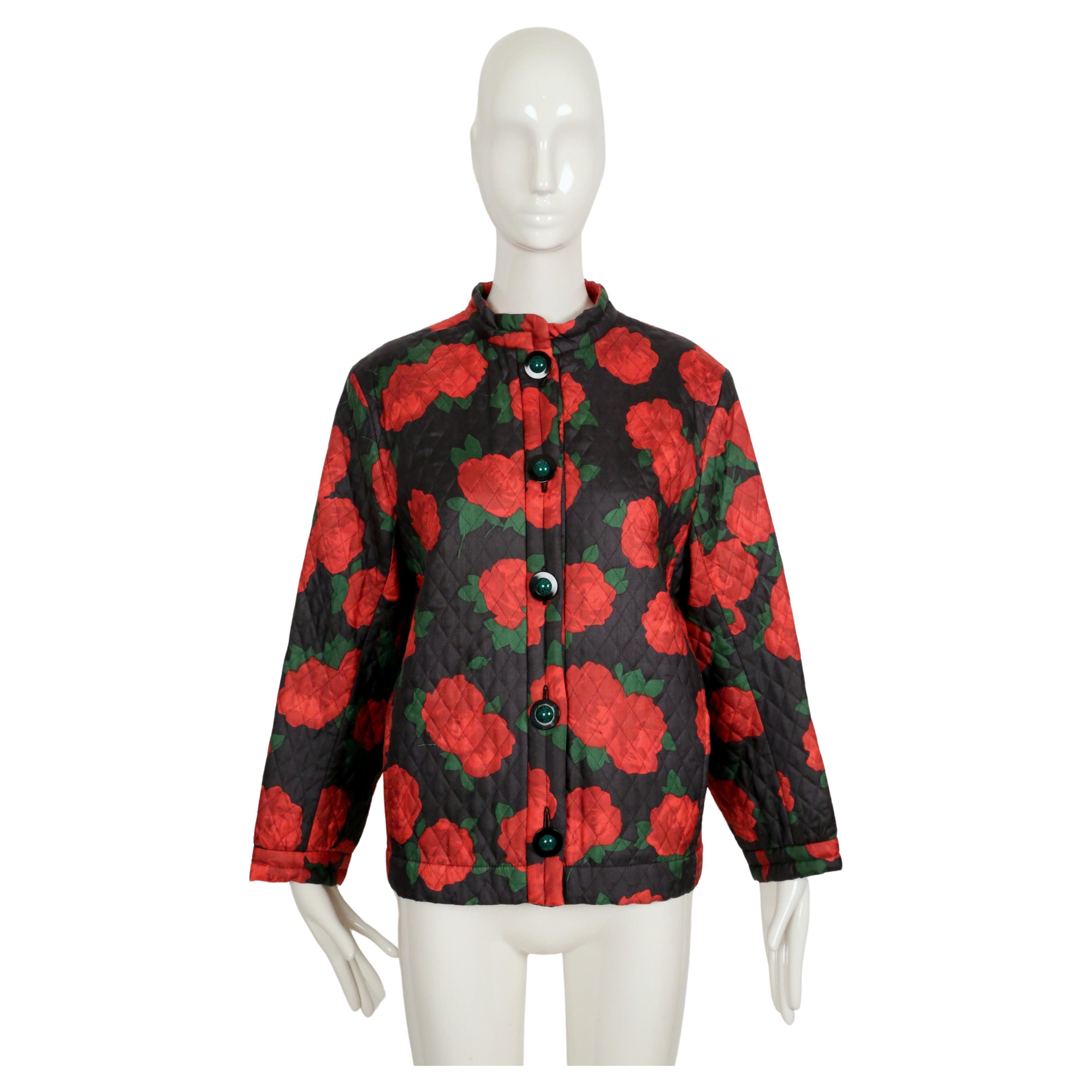 Vibrant, rose-printed silk jacket with quilting designed by Yves Saint Laurent dating to Fall of 1994 exactly as seen on the runway. The jacket features a boxy cut with a stand-up collar, hidden side pockets and closes with amazing black and green