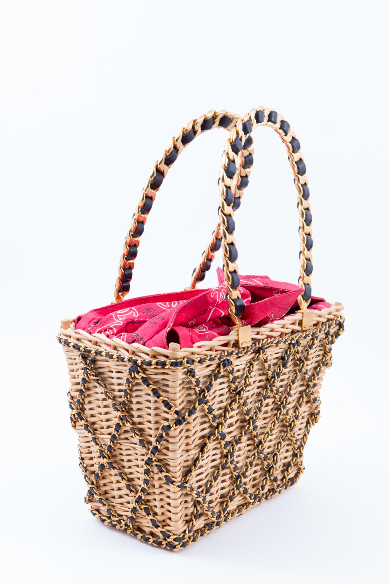 1994s Chanel collector wicker basket bag featuring chain embellished, a red bandana scarf lining cotton detail.
See attached 1994s catwalk images.
Osier Willow 100%, Straw 100%, Leather 100%
Made in France.
In good vintage condition. 
Length: