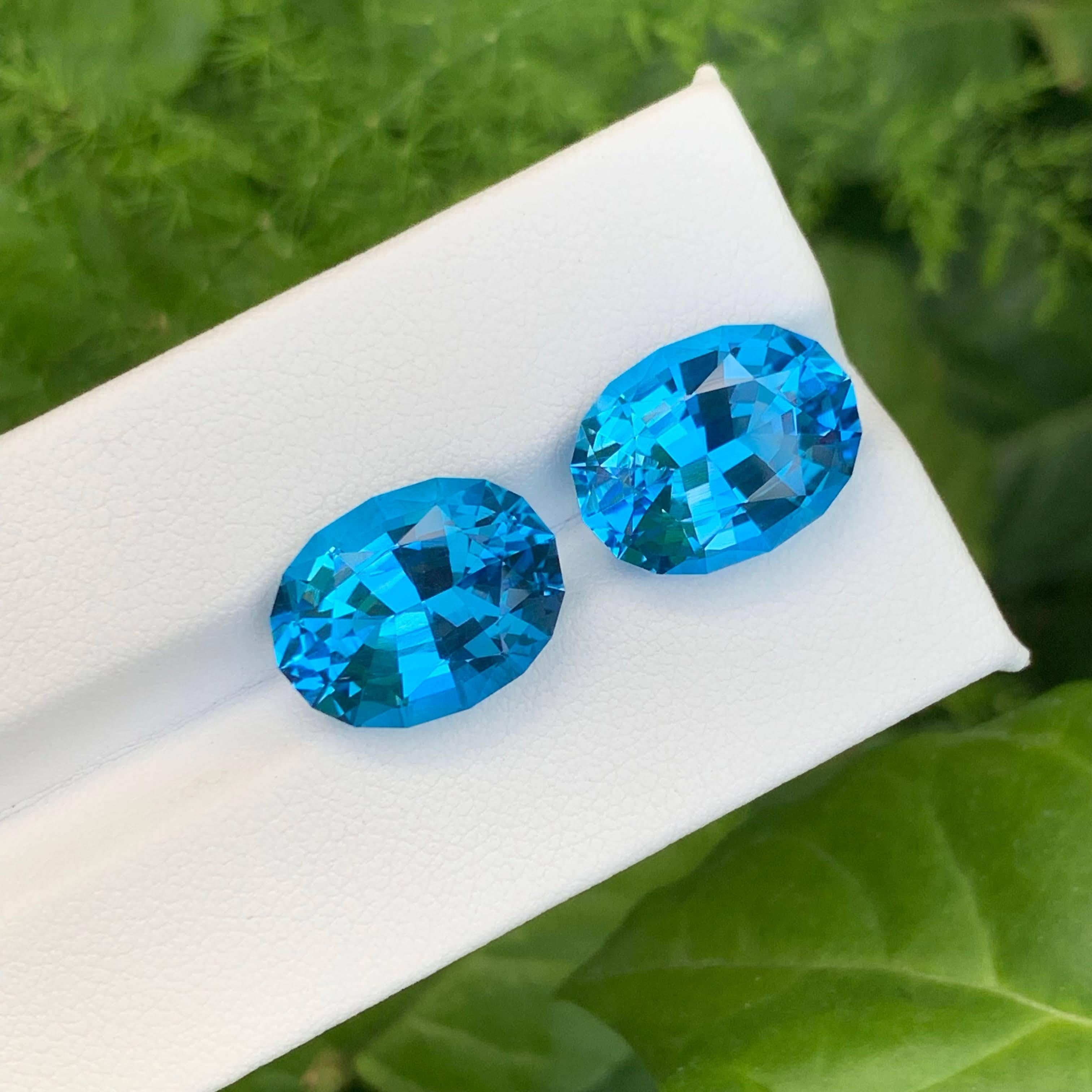 Taglio ovale 19,95 Carati di Topazio Blu Neon Naturale Sciolto Coppia Taglio Ovale Gemma del Madagascar in vendita