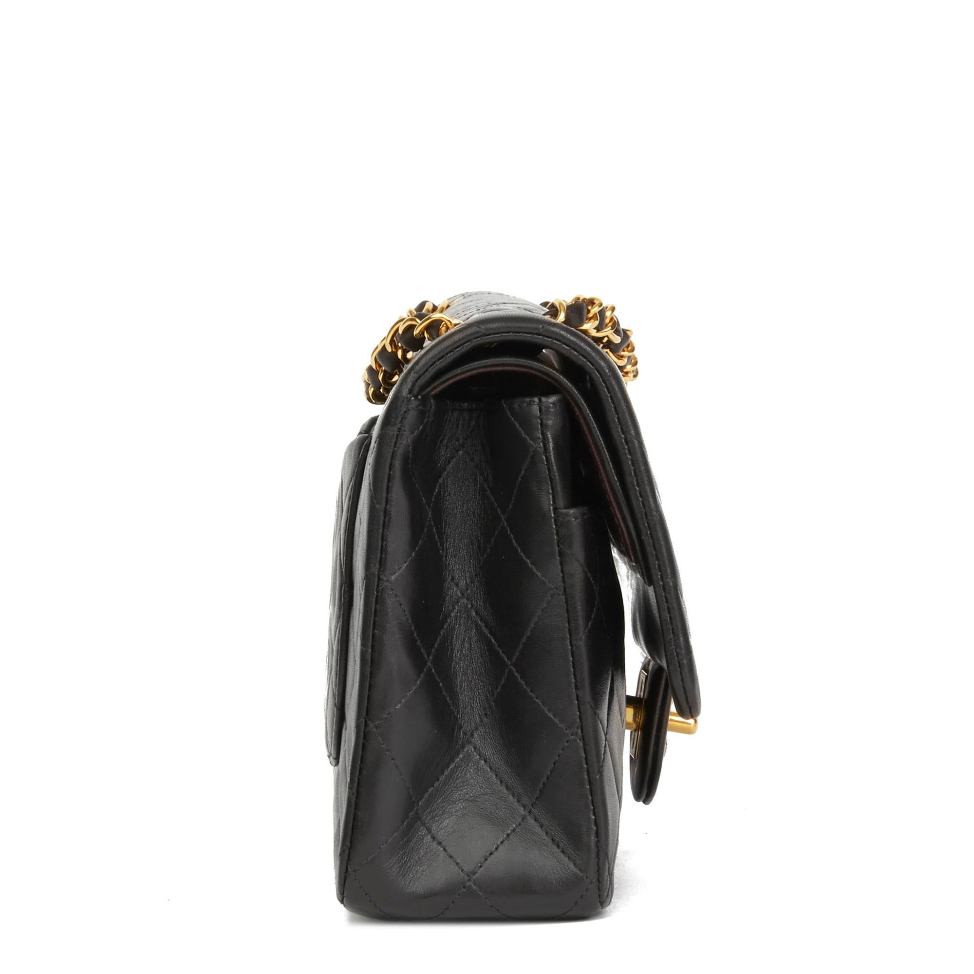 CHANEL
Black Quilted Lambskin Vintage Medium Classic Double Flap Bag

Xupes Reference: HB2955
Serial Number: 3263170
Age (Circa): 1995
Authenticity Details: Serial Sticker (Made in France)
Gender: Ladies
Type: Shoulder

Colour: Black
Hardware: Gold