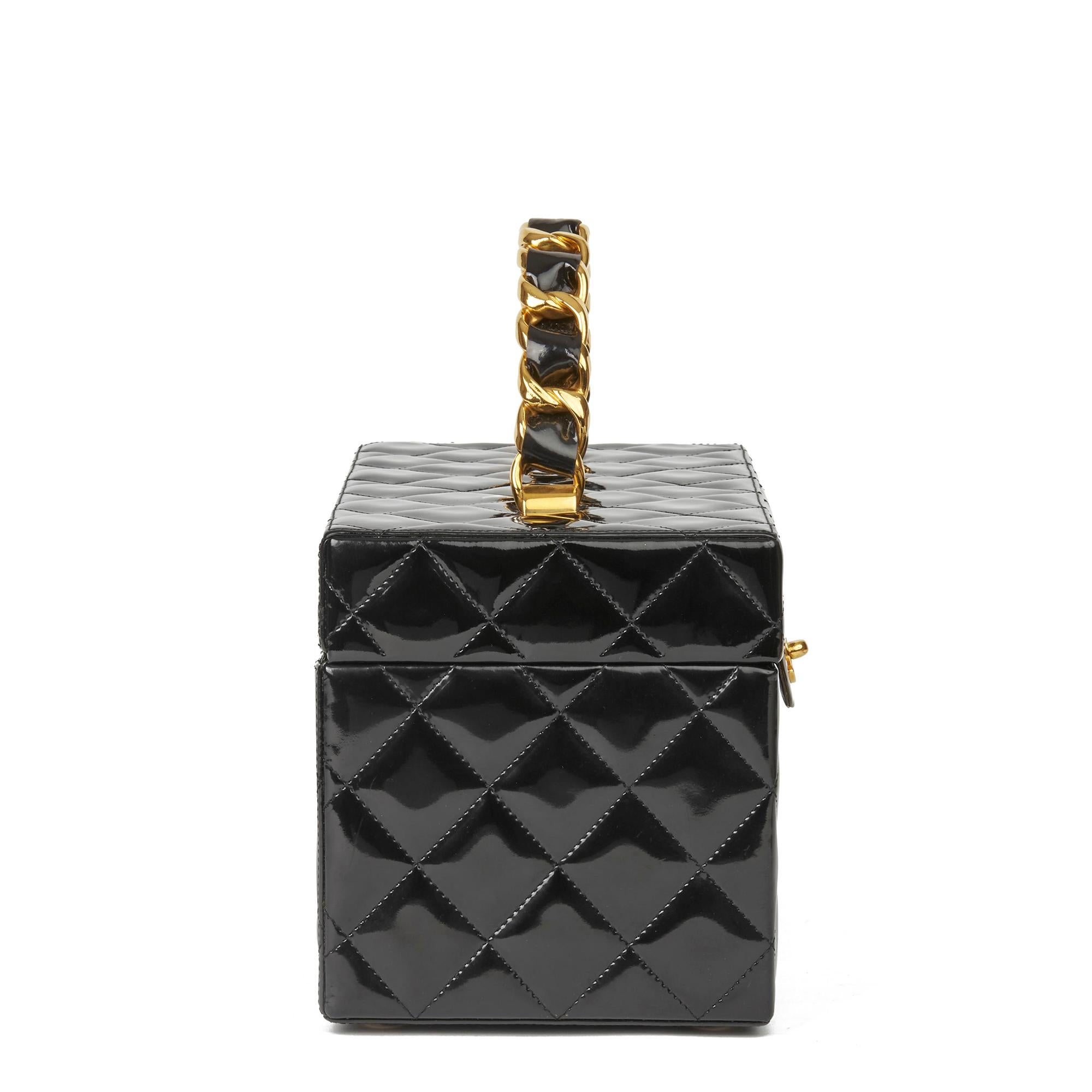 CHANEL
Black Quilted Patent Leather Vintage Classic Vanity Case

Xupes Reference: HB2973
Serial Number: 3937518
Age (Circa): 1995
Accompanied By: Chanel Dust Bag, Authenticity Card
Authenticity Details: Serial Sticker, Authenticity Card (Made in
