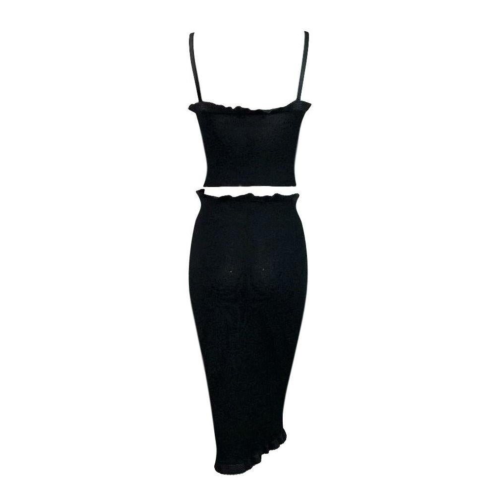 DESIGNER: 1995 Dolce & Gabbana

Please contact for more information and/or photos.

CONDITION: Good- No holes or stains

COUNTRY MADE: Italy

FABRIC: Viscose & Polyester

SIZE: 42 runs small w stretch

MEASUREMENTS; provided as a courtesy only- not