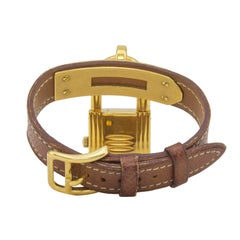 1995 Hermes Kelly Uhr aus hellbraunem Leder mit goldener Hardware