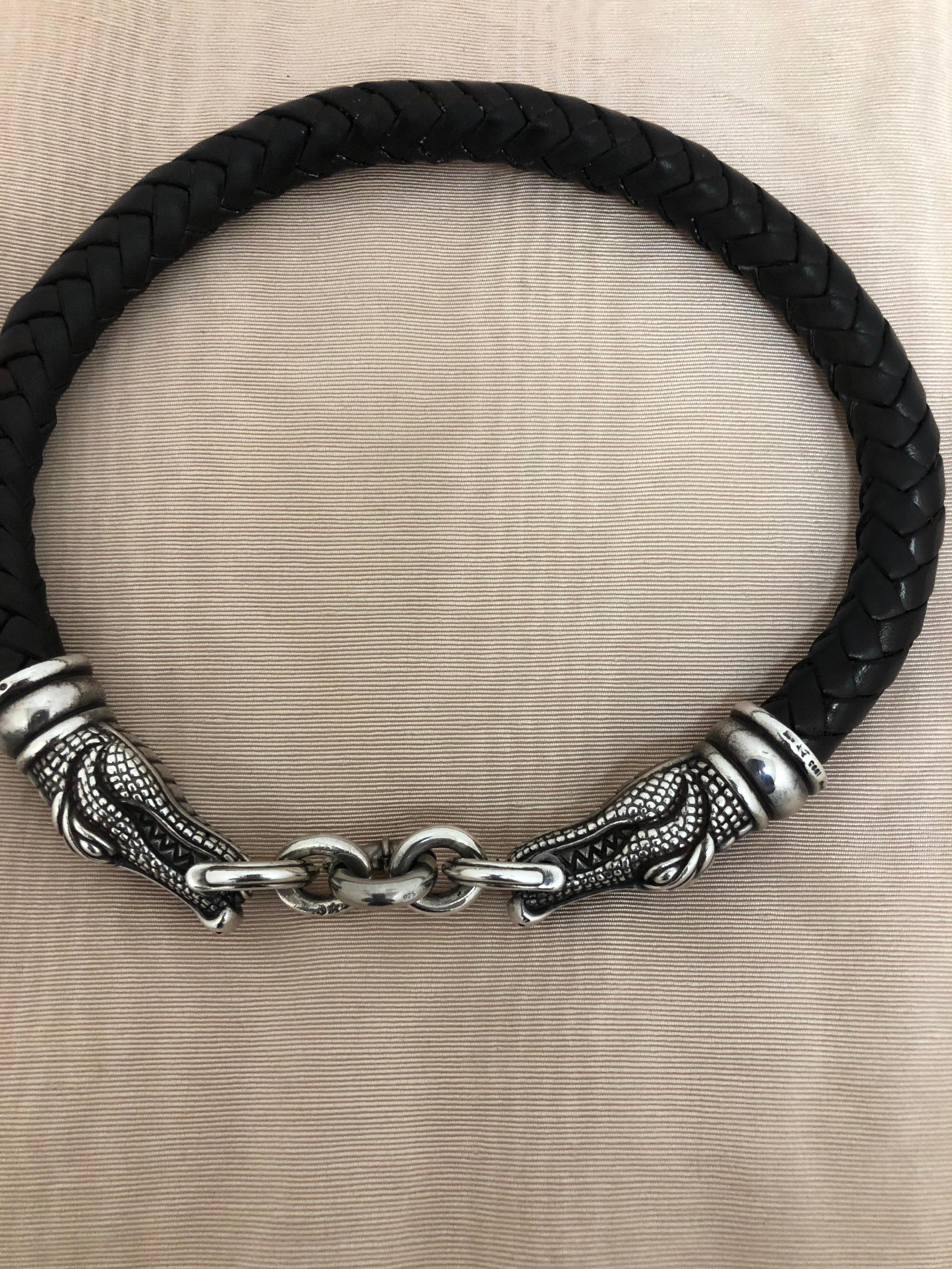 A work of art! This 1995 sterling silver and brown braided leather combo is in immaculate condition and comes with its pouch. The workmanship is superior and it is such a statement piece.

The silver alligator heads are stamped Kieselstein-Cord 1995