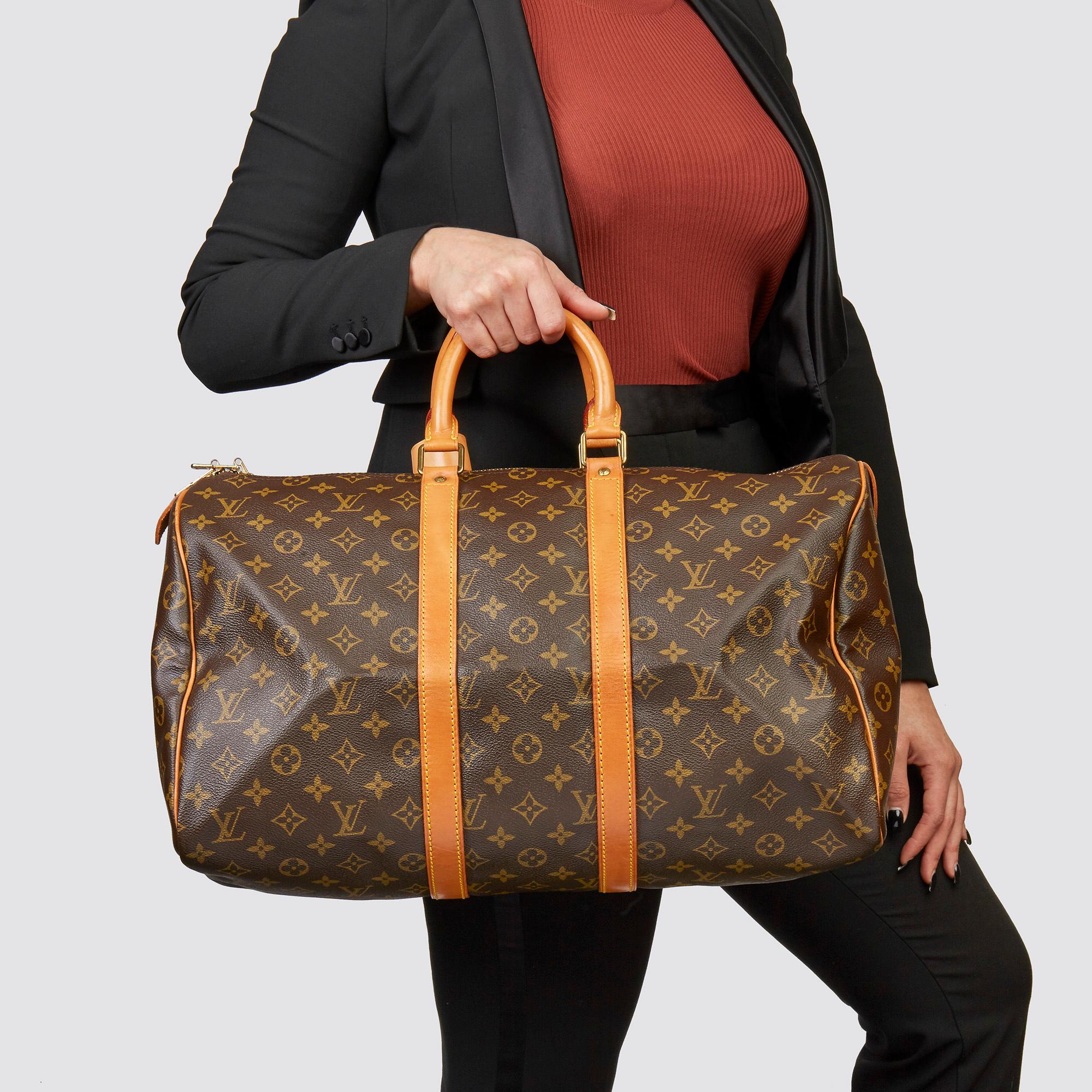 LOUIS VUITTON
Brown Monogram Coated Canvas & Vachetta Leather Vintage Keepall 45

Xupes Reference: HB3574
Serial Number: SP0935
Age (Circa): 1995
Accompanied By: Handle Keeper, Luggage Tag
Authenticity Details: Date Stamp (Made in France) 
Gender: