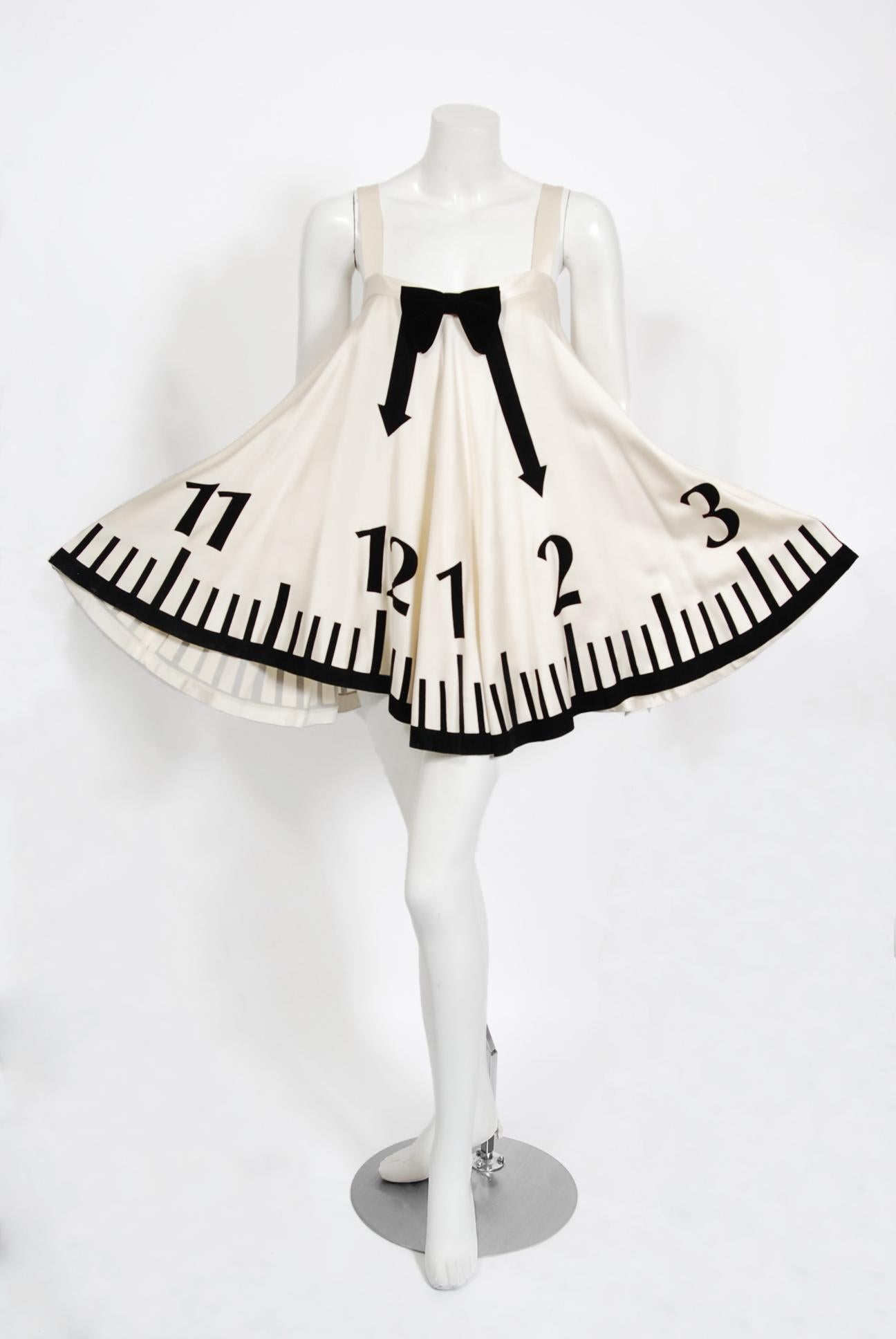Sensational Moschino 'Alice in Wonderland' collection appliqué silk full-circle mini dress. Would be perfect for the upcoming MET 