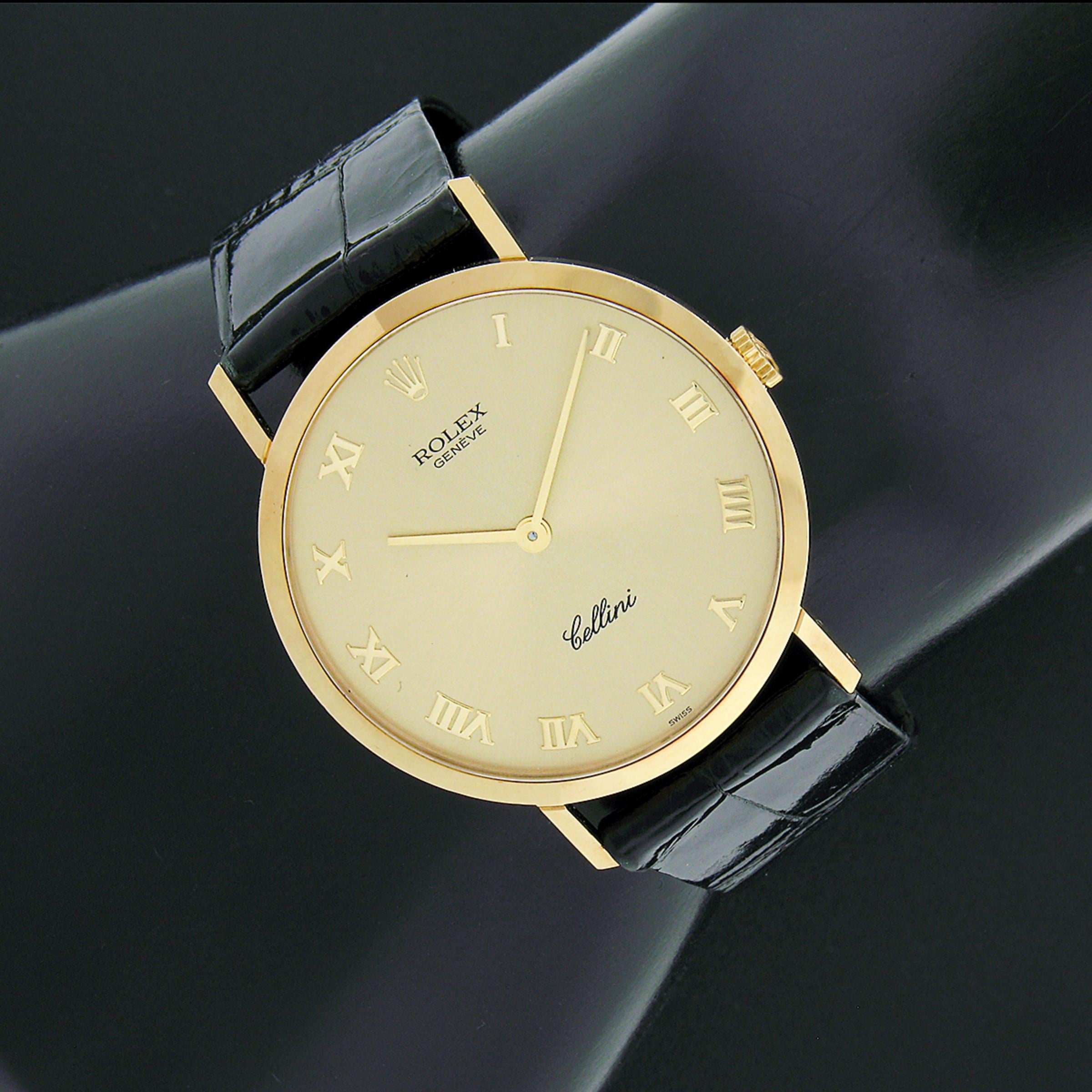 Here we have a gorgeous, 100% authentic, Rolex Cellini made from solid 18k yellow gold. This watch features an elegant 32mm case with smooth bezel and its original black crocodile strap with its original solid 18k yellow gold buckle and tang. The