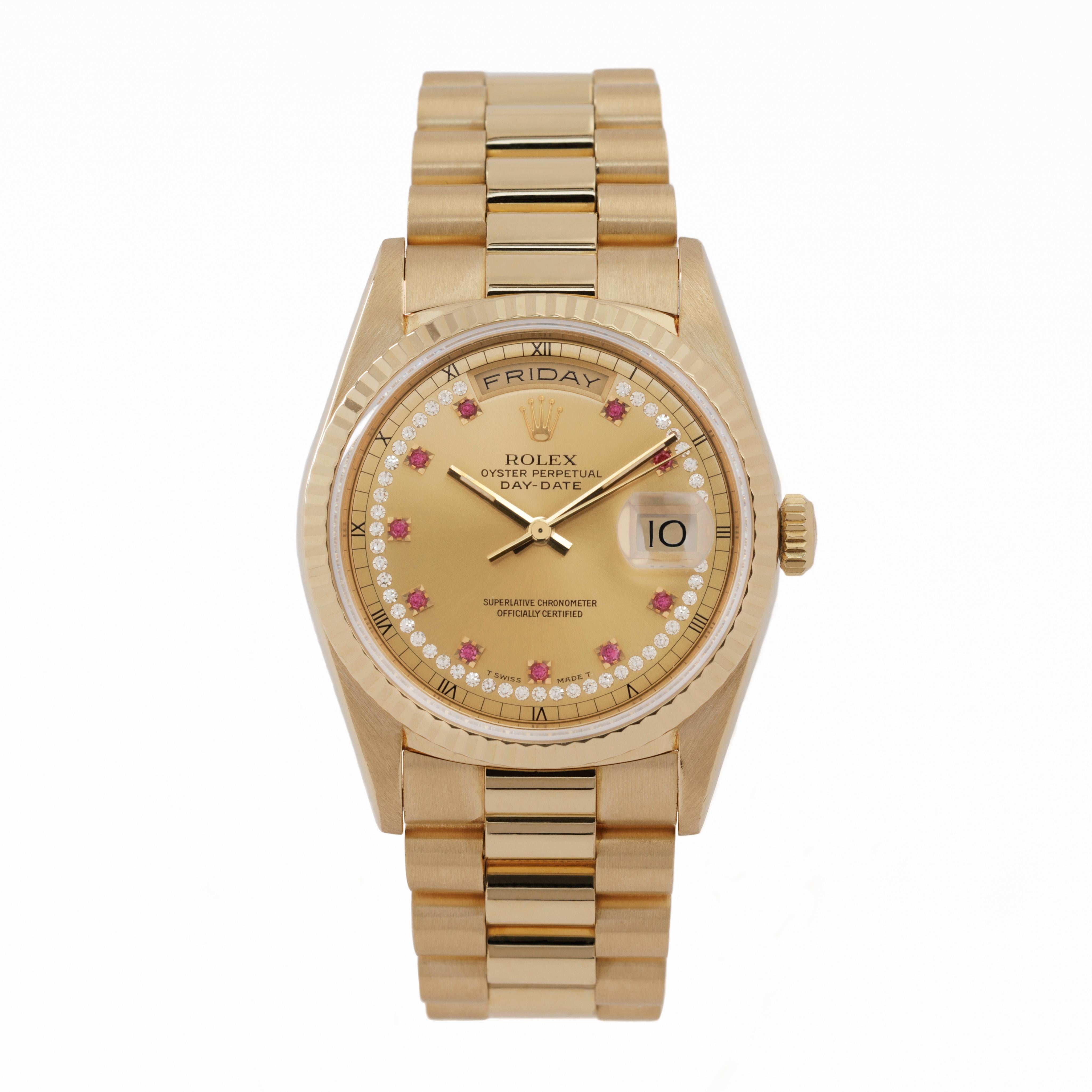 1999 Rolex Day-Date President 18 Karat Yellow Gold and Ruby and Diamond String 36mm Dial with Original Box & Papers
Model 18238
c.1999

The 1999 Rolex Day-Date President is the crown jewel of the Rolex catalog. Debuting in 1956, the Day-Date is the
