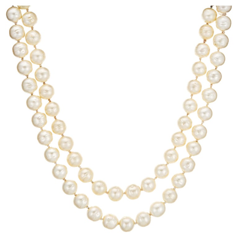 Chanel Logo Long Pearl Necklace - 27 For Sale on 1stDibs  chanel long  pearl necklace, chanel inspired pearl necklace, chanel style pearl necklace