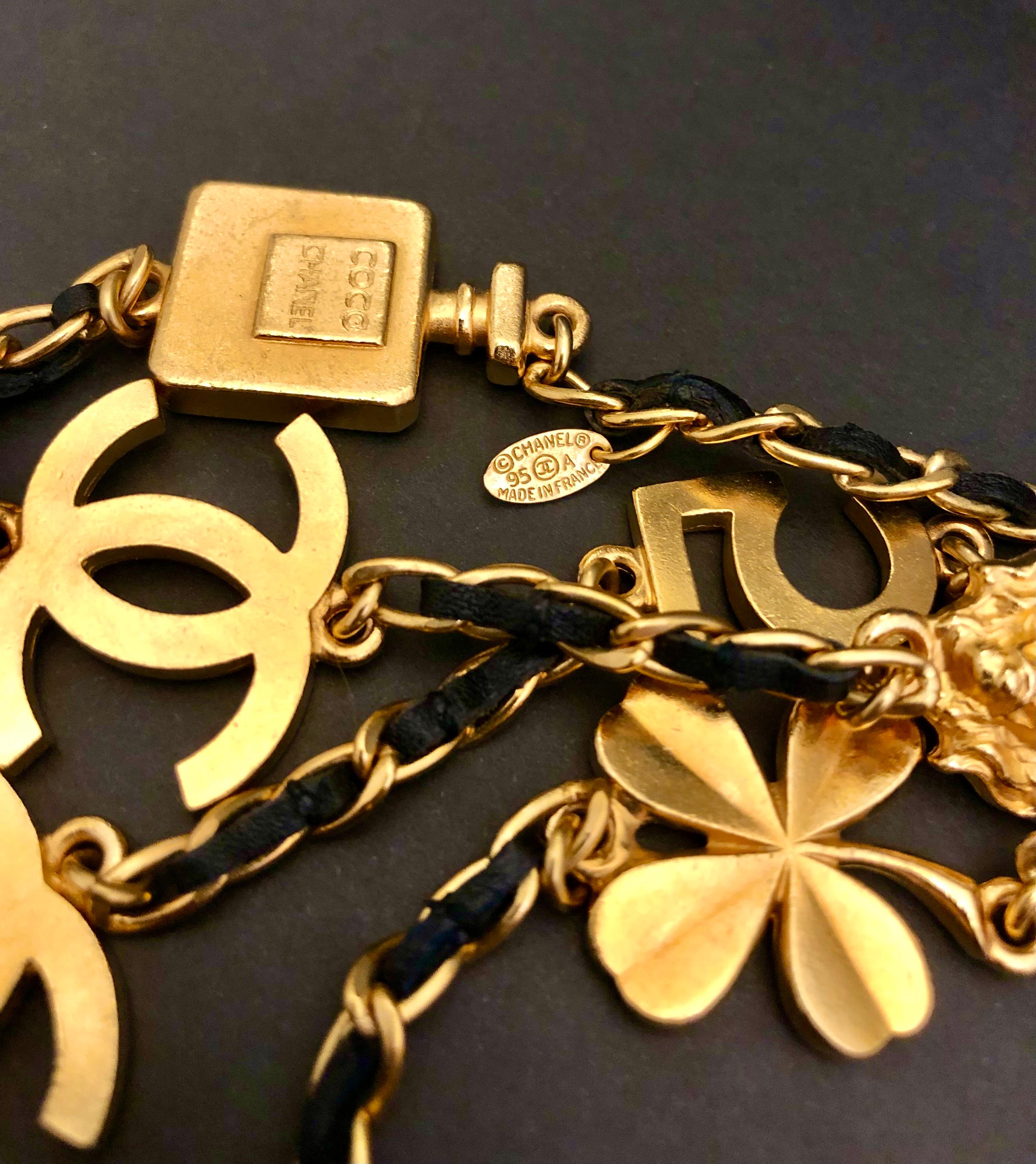 1995 Vintage CHANEL Gold Toned Long Chain Necklace CC No.5 Camellia Lion Clover In Excellent Condition For Sale In Bangkok, TH