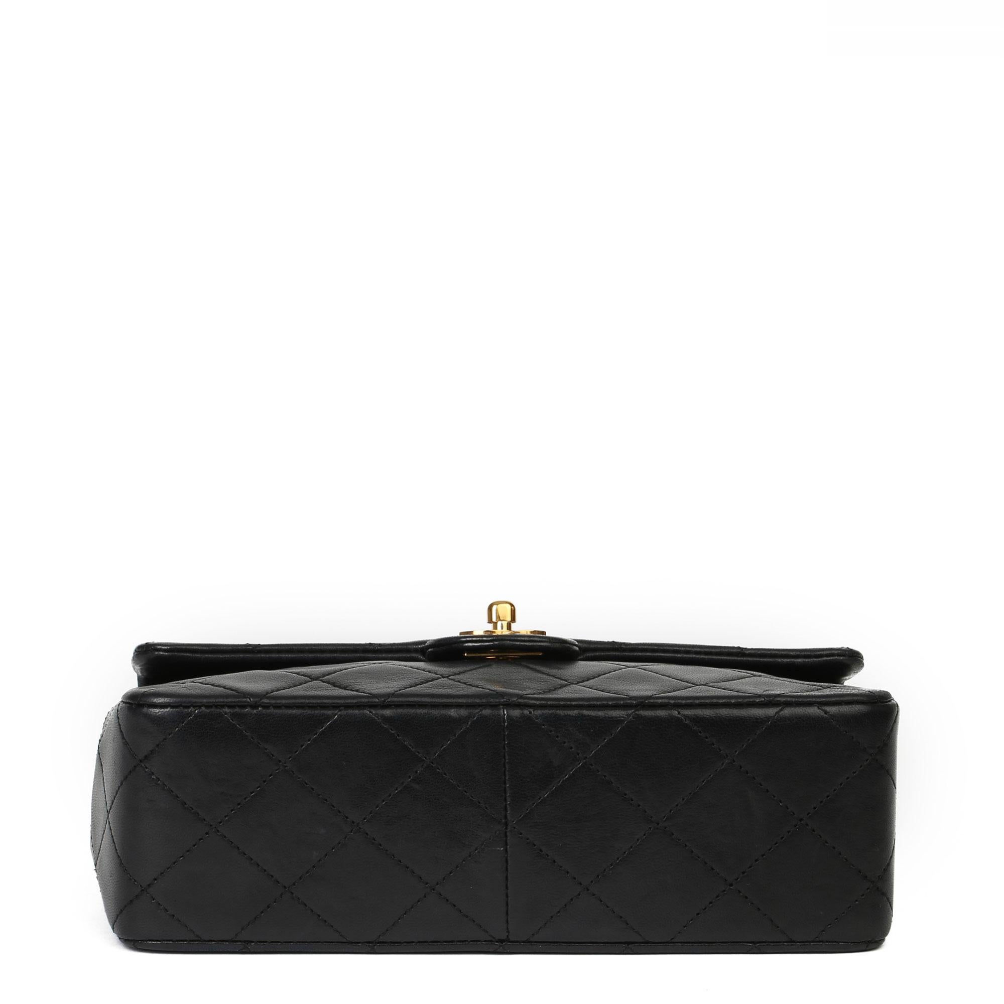 CHANEL
Black Quilted Lambskin Mini Flap Bag 

Xupes Reference: HB3958
Serial Number: 3428839
Age (Circa): 1996
Accompanied By: Chanel Dust Bag 
Authenticity Details:  Serial Sticker (Made in France) 
Gender: Ladies
Type: Shoulder, Crossbody

Colour: