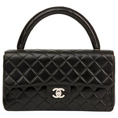 1996 Chanel Sac à rabat Classic Kelly Vintage en cuir d'agneau matelassé noir de taille moyenne