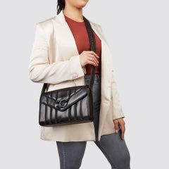 1996 Chanel Black Vertical Quilted Lambskin Vintage Logo Shoulder Flap Bag