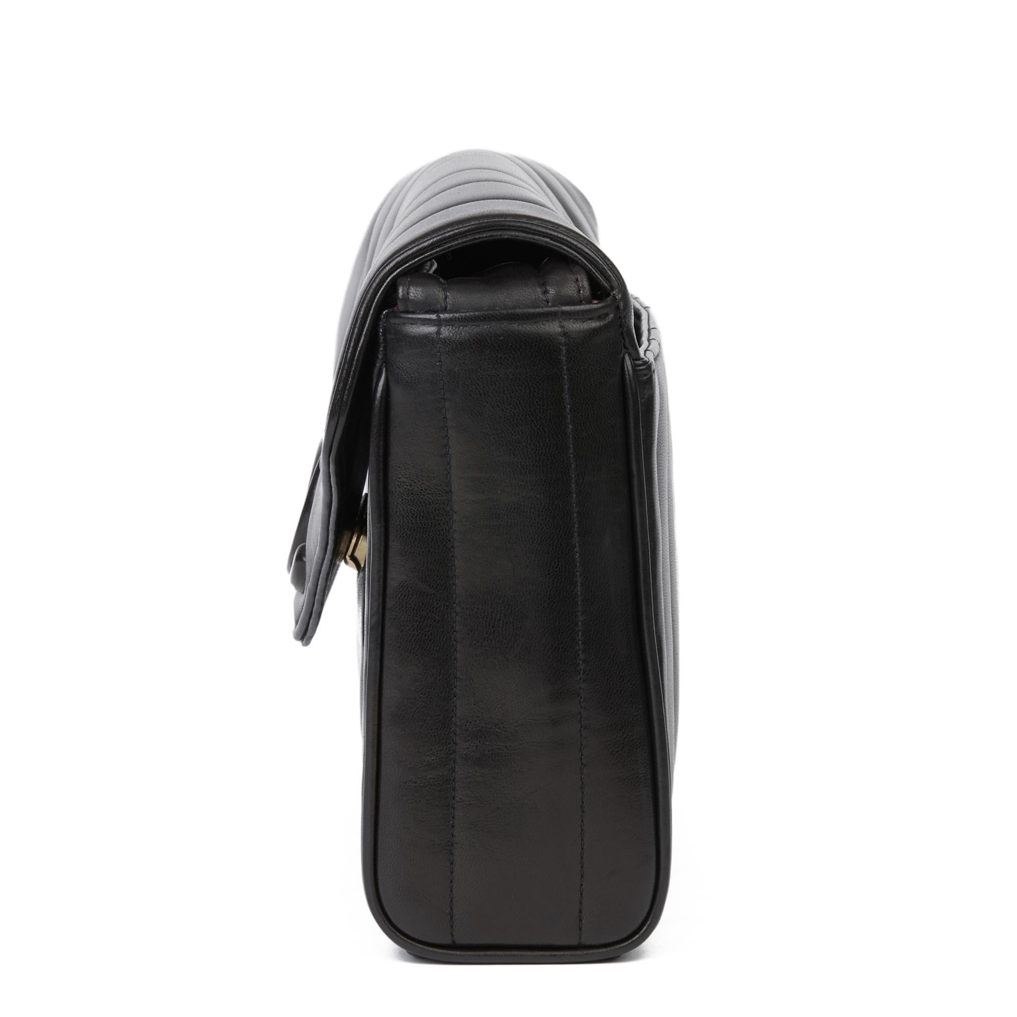 Women's or Men's 1996 Chanel Black Vertical Quilted Lambskin Vintage Logo Shoulder Flap Bag