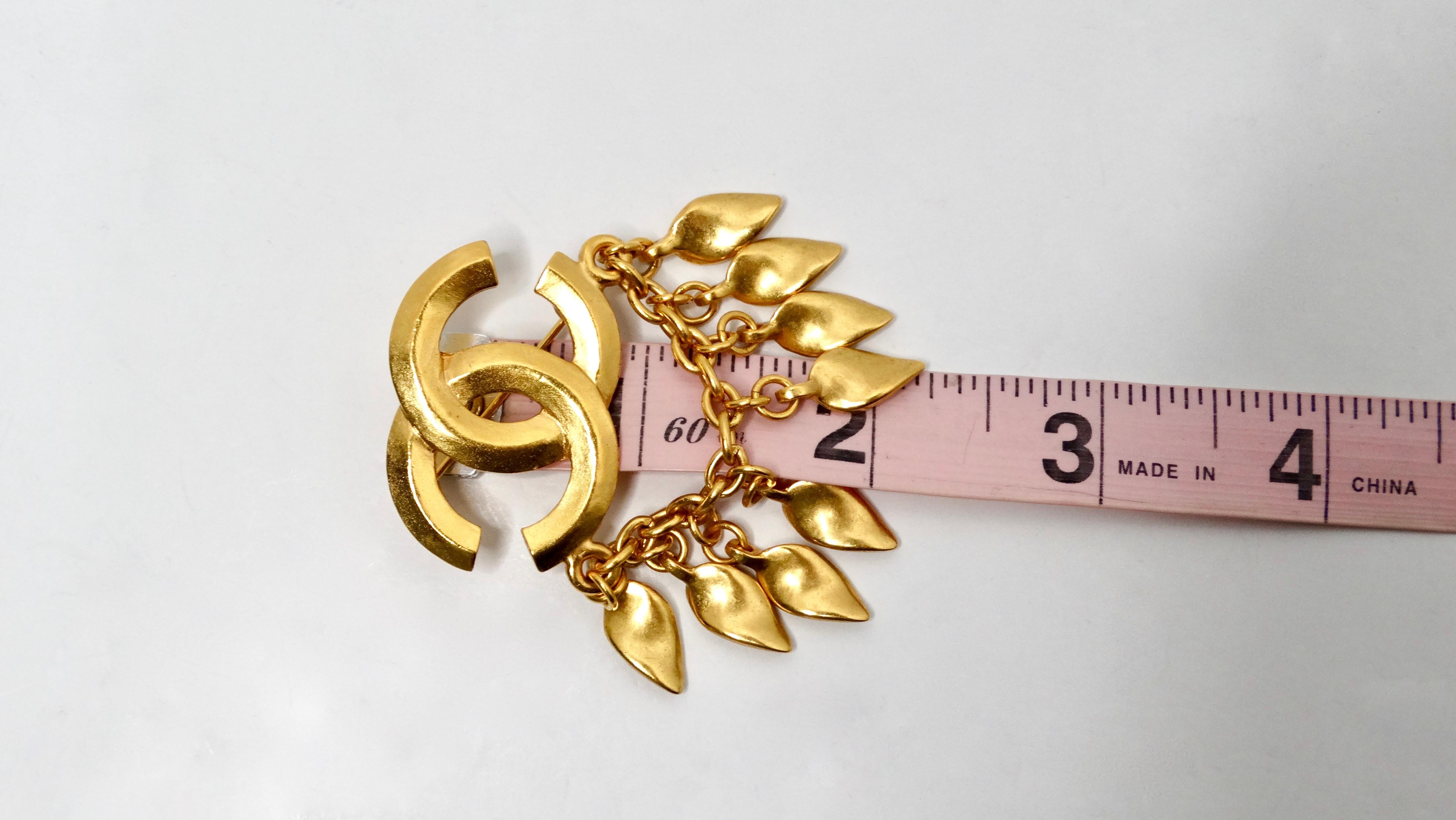 1996 Chanel Coco Mark Yellow Gold-Tone Brooch With Dangling Charms For Sale 1
