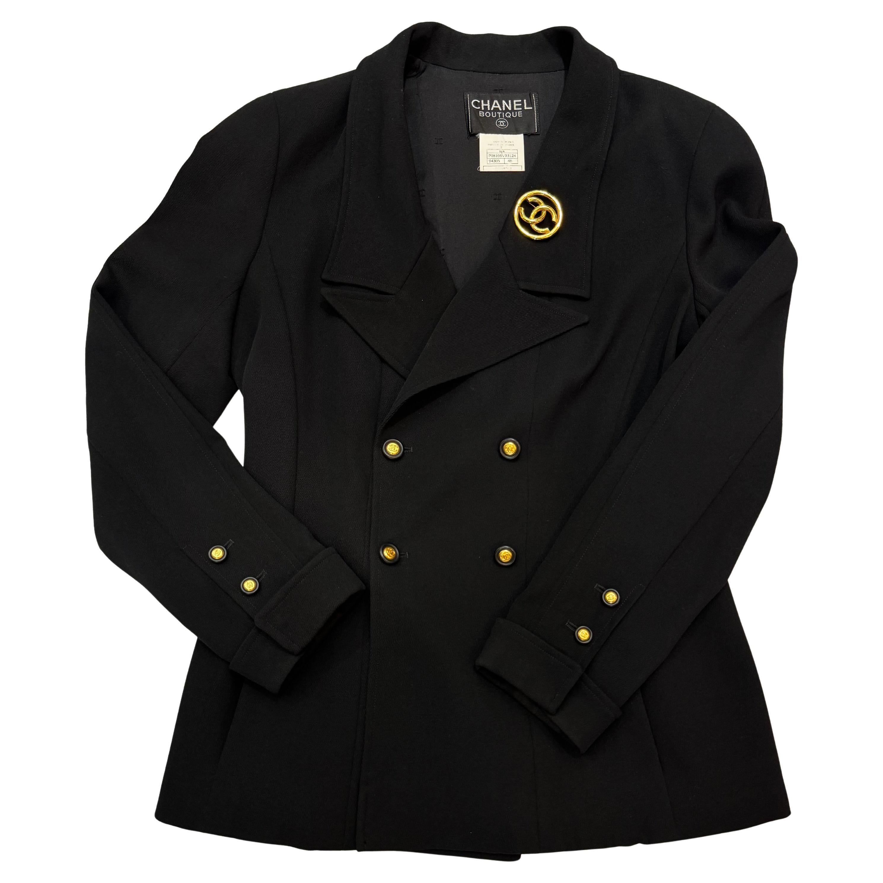 This vintage CHANEL blazer is crafted of 100% wool fabric featuring a double-breasted front and double-cuffed sleeves from the 96A collection. This blazer also features two concealed side pockets. This Chanel blazer is lined with CC embroidered