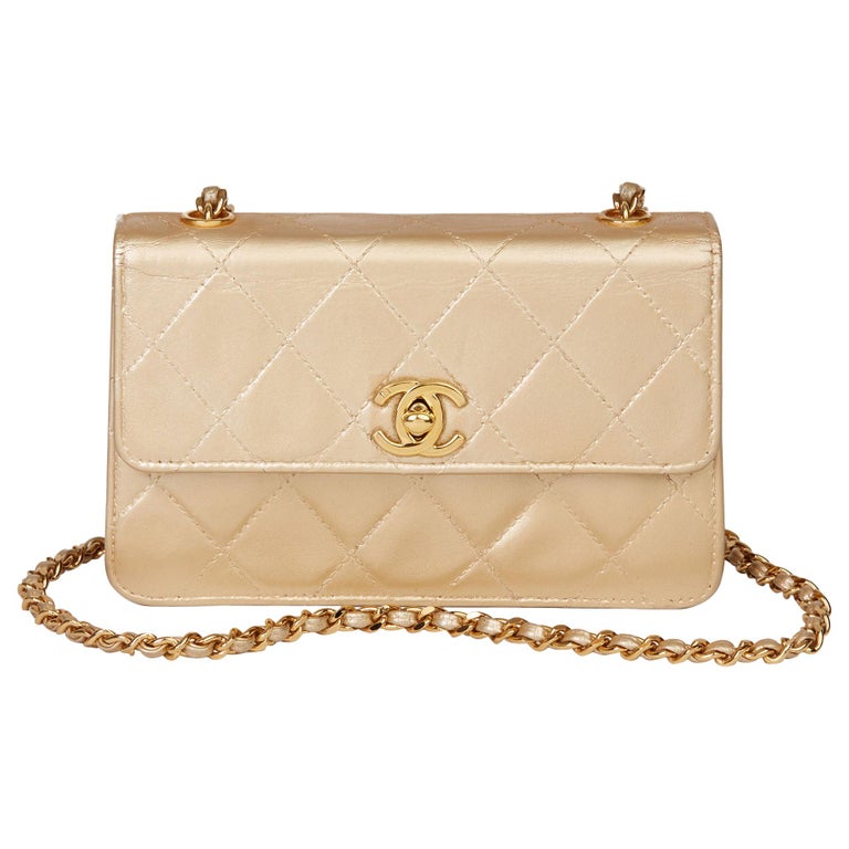 1996 Chanel Gold Quilted Metallic Lambskin Vintage Mini Flap Bag at 1stDibs
