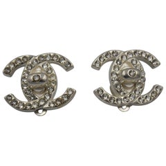 1996 Chanel Vintage  Trunlock Earrings  xith Swarovski Crystals