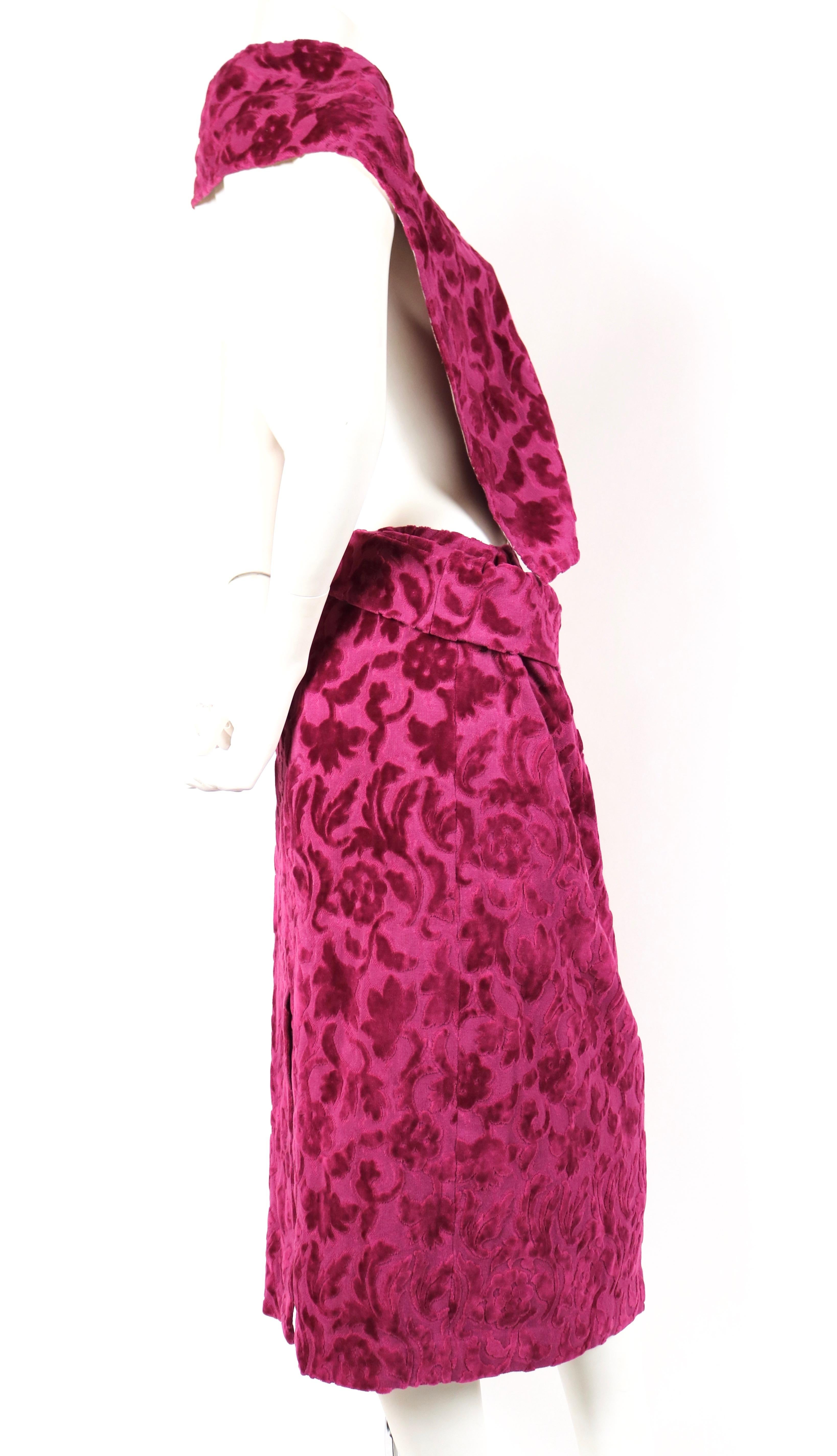Very rare, magenta-purple flocked draped dress with open back designed by Rei Kawakubo for Comme Des Garcons dating to fall of 1996. Labeled a size 'S'. Waist fits up to 26.5