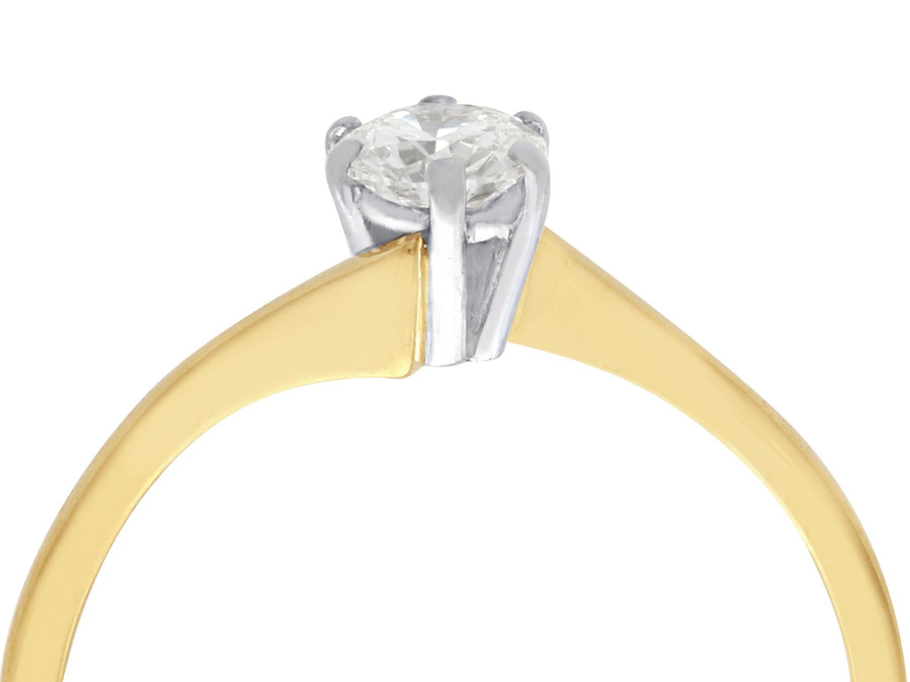 A fine and impressive 0.37 carat diamond and 18 karat yellow gold solitaire twist ring; part of our contemporary jewelry and estate jewelry collections.

This fine and impressive contemporary diamond solitaire twist ring has been crafted in 18k