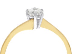 Diamond and Yellow Gold Solitaire Twist Engagement Ring