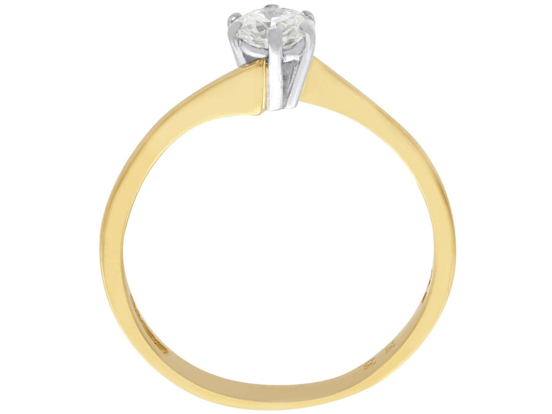 Round Cut Diamond and Yellow Gold Solitaire Twist Engagement Ring For Sale