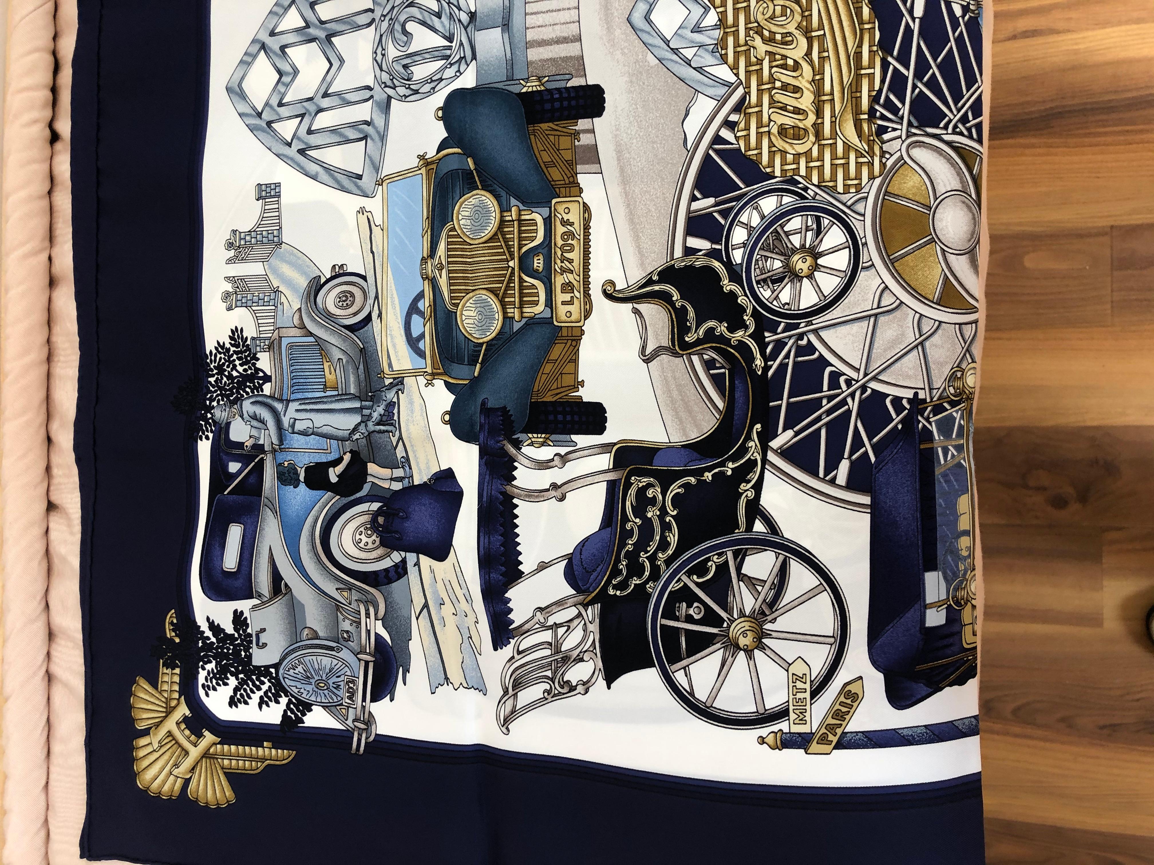 Any cars lovers? This Hermes twill silk scarf designed in 1996 by Joachim Metz is replete with images of some of the most iconic early automobiles.

The borders and background are a lovely royal blue with a multitude of other colors. The scarf comes