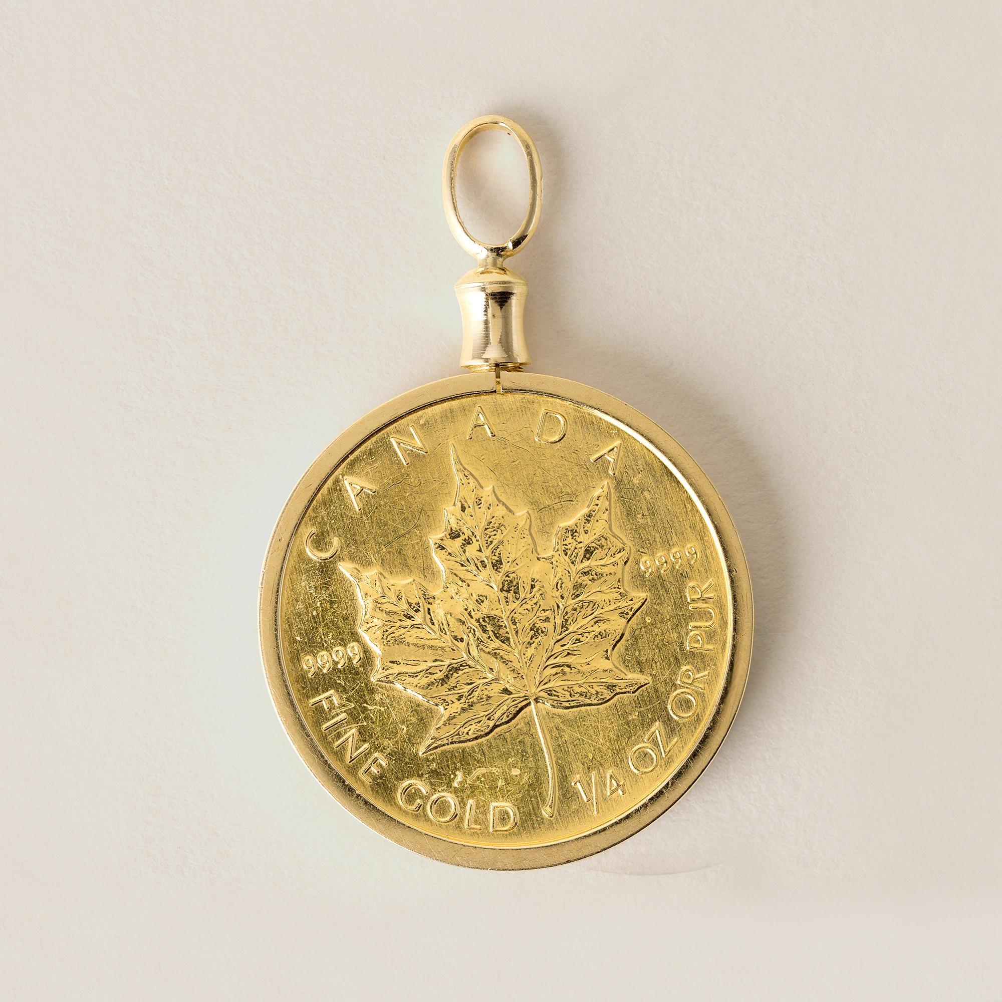 Moneta da 10 dollari canadese Queen Elizabeth Maple
1996
1/4 OZ di oro puro
9 grammi
Lunghezza 0,8 pollici diametro della lunetta
2,5 mm di larghezza
1,2 pollici con balla
Lunetta e balla in oro 18 carati