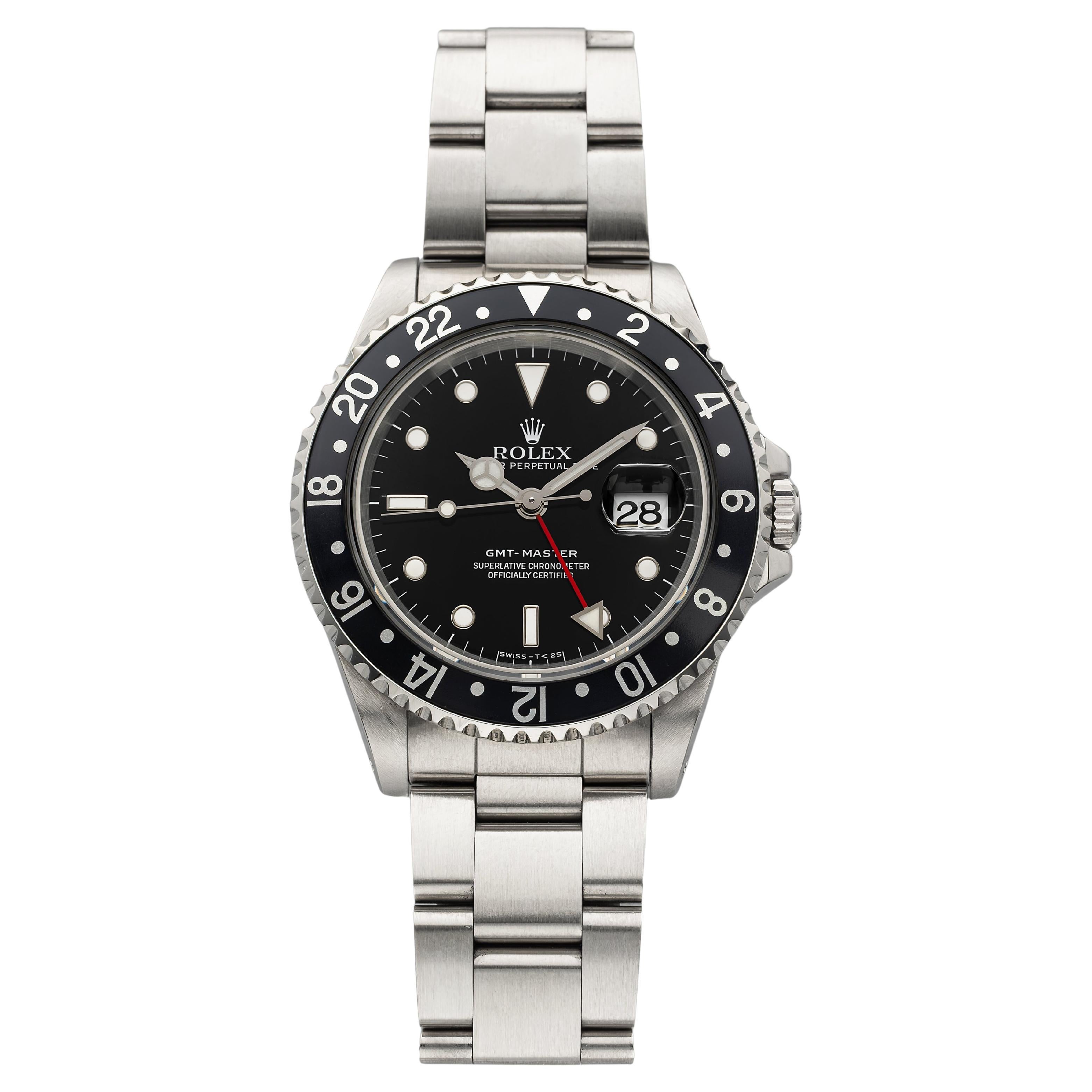 1999 Rolex GMT-Master 16700 Steel Auto Black Bezel 40mm For Sale