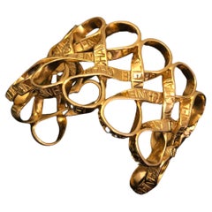 1996 Vintage CHANEL Gold Toned Infinity Ribbon Cuff Bracelet