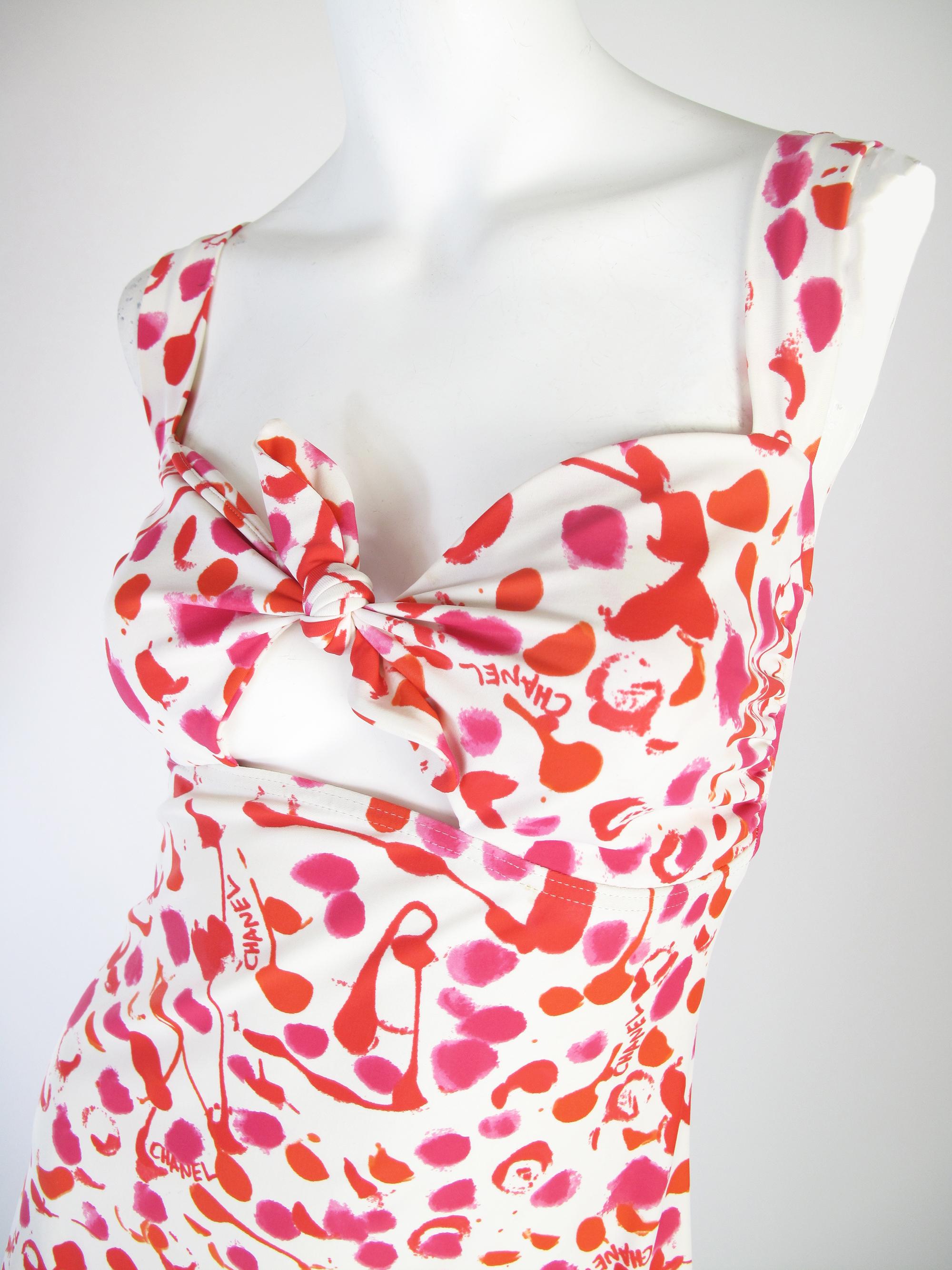 1996 Chanel splatter print mini dress with keyhole tie at front. Has stretch: nylon & spandex material. Condition: Very good, small marks, hard to see with print. Size 40 ( mannequin is US size 6 )
