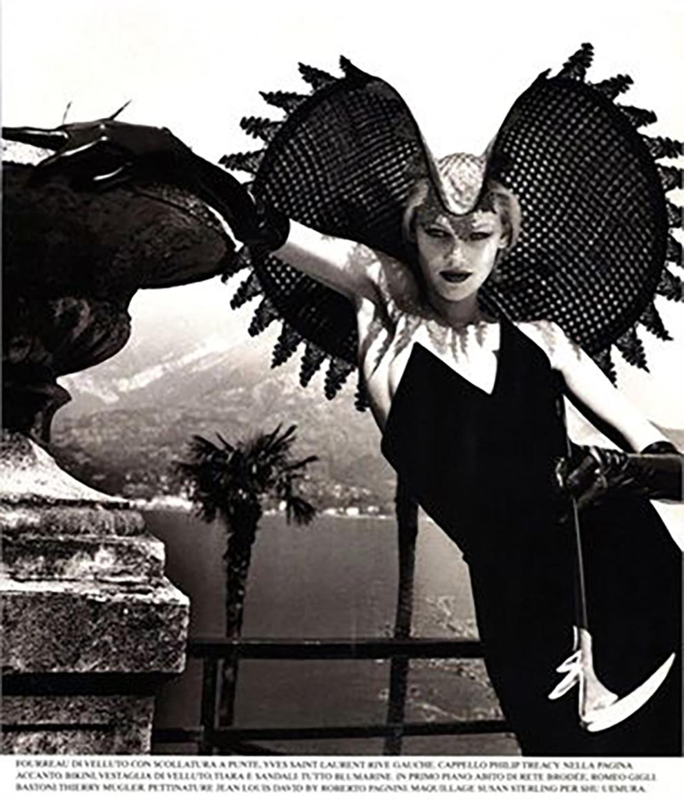 Iconic 1996s Yves Saint Laurent black raven velvet strapless dress featuring a slim fit, a v-neck, a long length and a pointed bustier. See attached Helmut Newton image in Vogue Italia.
65% Viscose 35% Cupro
In excellent vintage condition. Made in