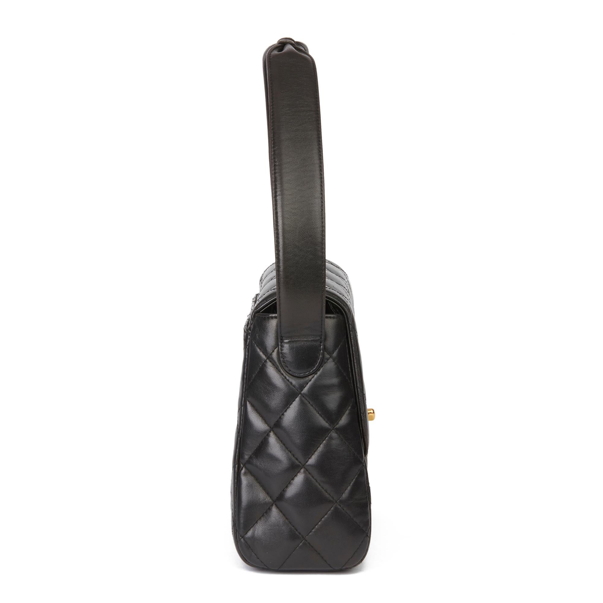 CHANEL
Black Quilted Lambskin Vintage Classic Shoulder Bag 

Xupes Reference: HB3201
Serial Number: 4769402
Age (Circa): 1997
Accompanied By: Authenticity Card
Authenticity Details: Serial Sticker, Authenticity Card (Made in France)
Gender: