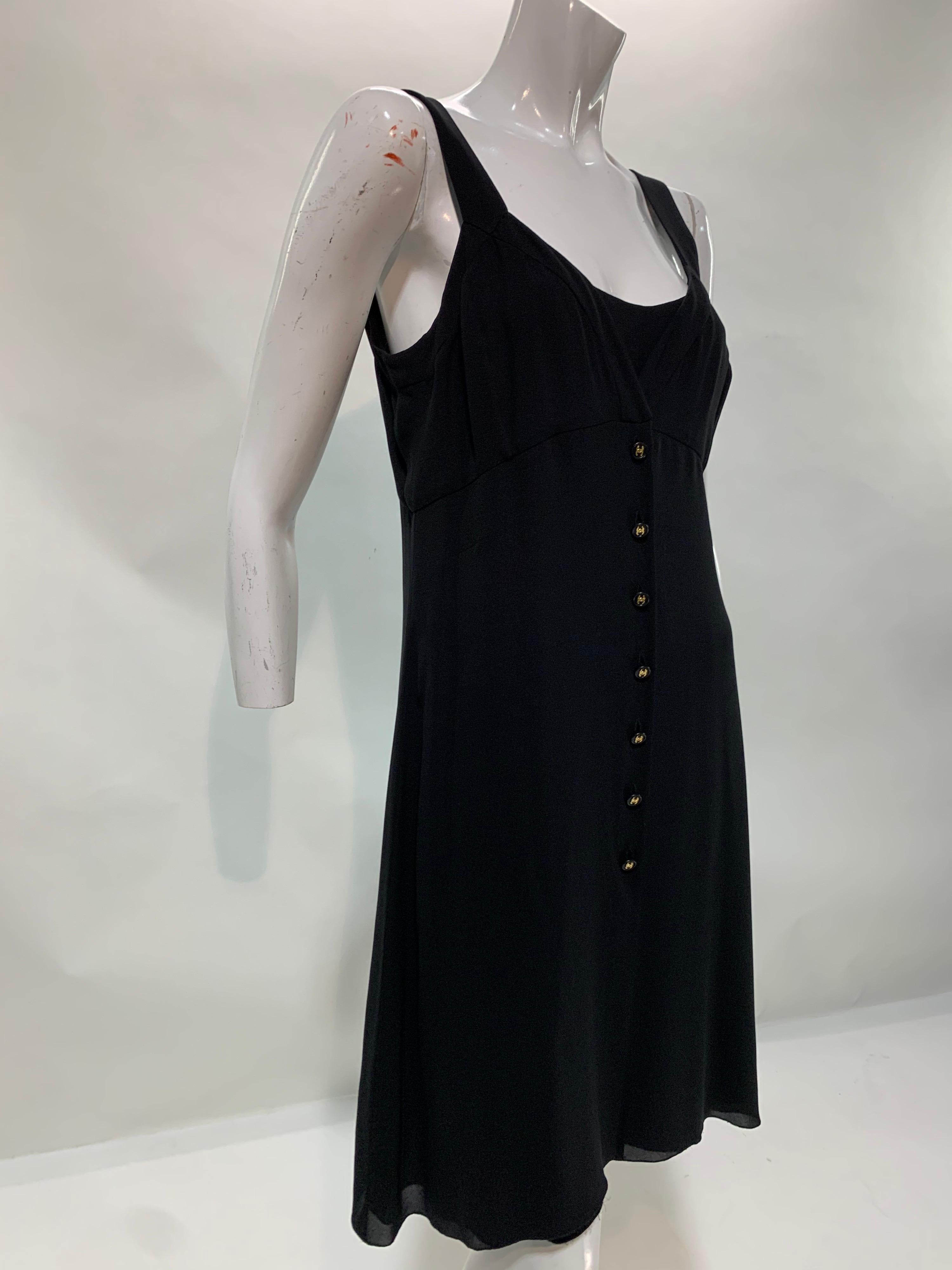 A wonderful Chanel 1997 Spring Collection 2-piece silk crepe slip dress by Karl Lagerfeld in essential basic black. Buttons down the front with 