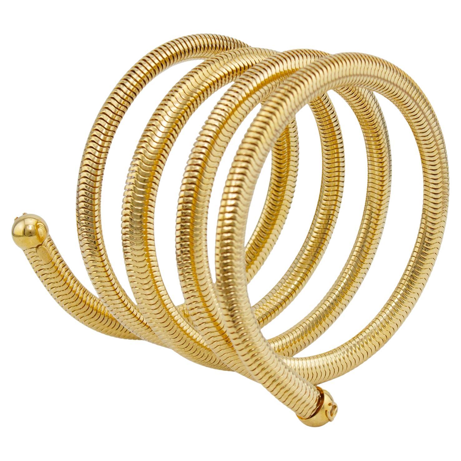 1997 Chanel Pulsera de espiral de metal dorado