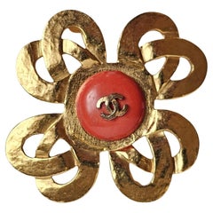 1997 Chanel Coral Enamel Gold Hammered Clover Brooch