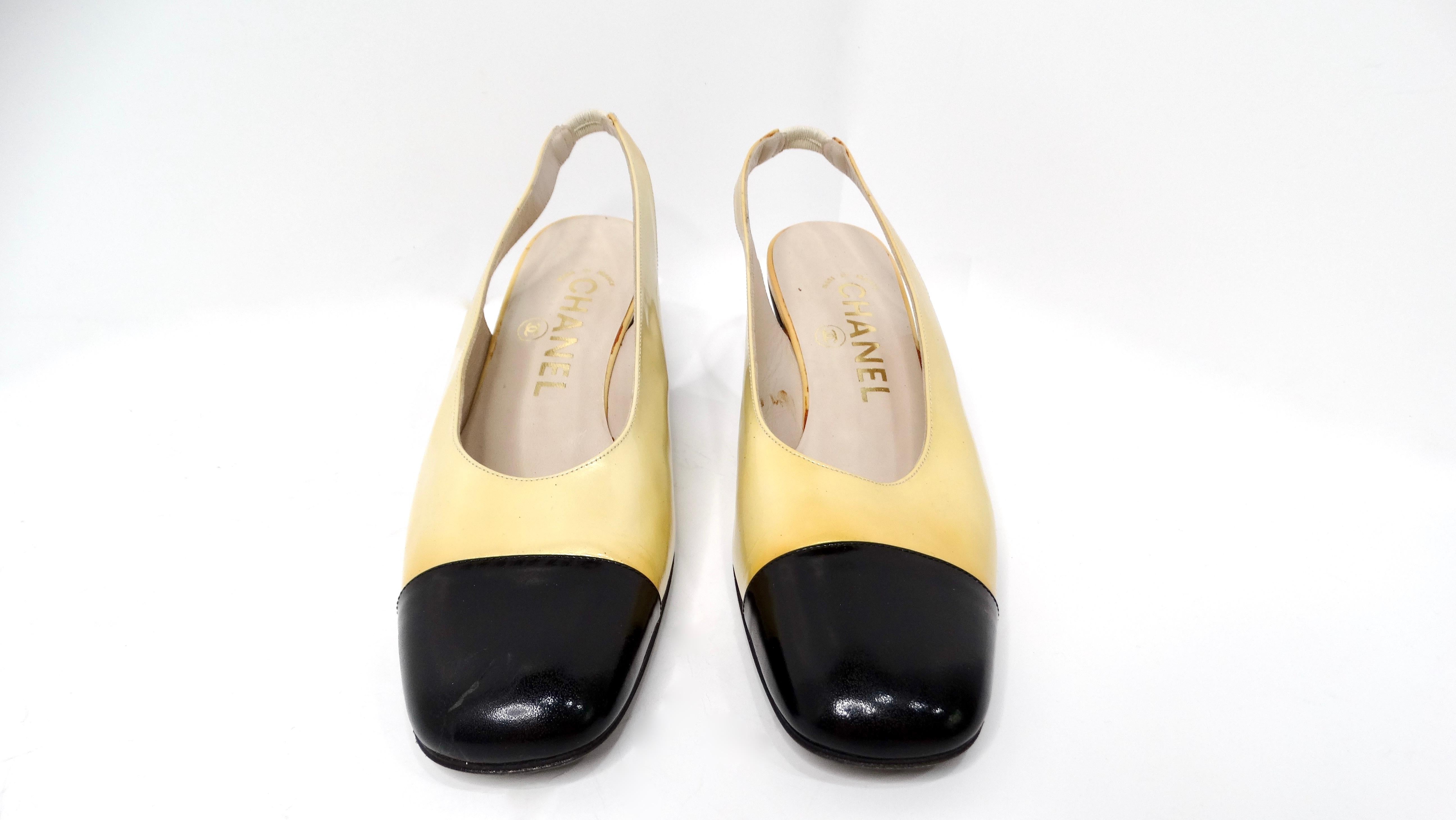 The 1997 Chanel Yellow Patent Leather Slingback Pumps are a striking fusion of color and sophistication, exemplifying the timeless elegance of Chanel design. The yellow/metallic gold color patent leather radiates a cheerful energy, perfectly