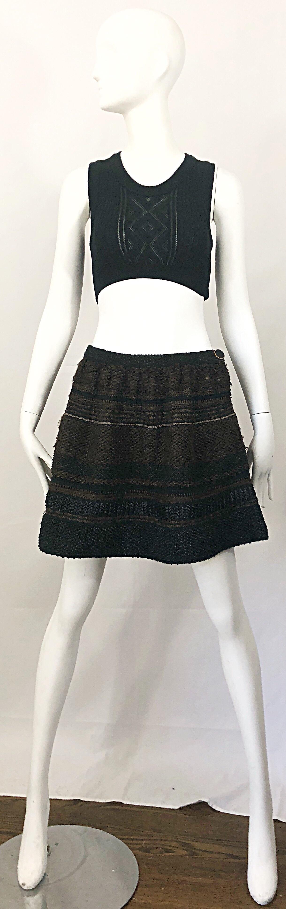 Rare from the premiere Stella McCatney for Chloe Collection in 1997! This vintage skirt is a collector's item, and is in fantastic condition. Sits low on the hips, and has a flattering flared A - Line fit. Super luxurious fabric content; 51% Cotton,