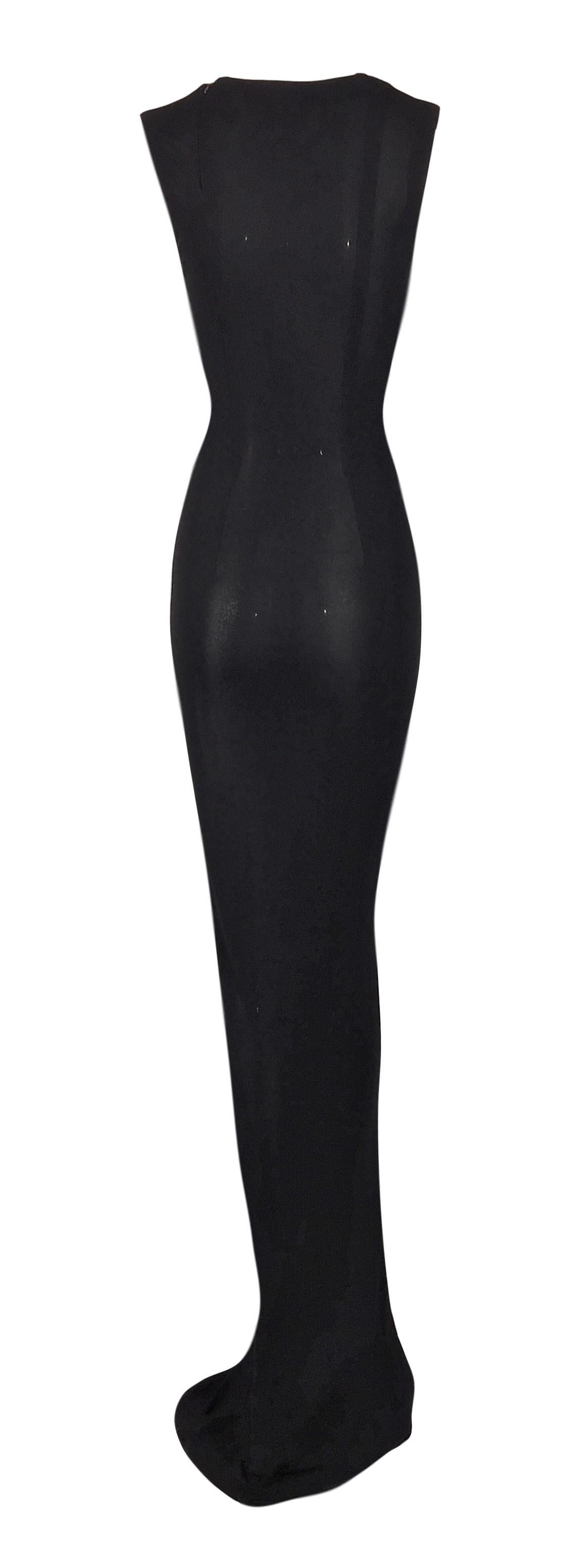 DESIGNER: 1997 Gucci by Tom Ford

Please contact for more information and/or photos.

CONDITION: Good- no flaws!

FABRIC: 100% viscose

COUNTRY MADE: Italy

SIZE: 42- runs quite small with stretch

MEASUREMENTS; provided as a courtesy only- not a
