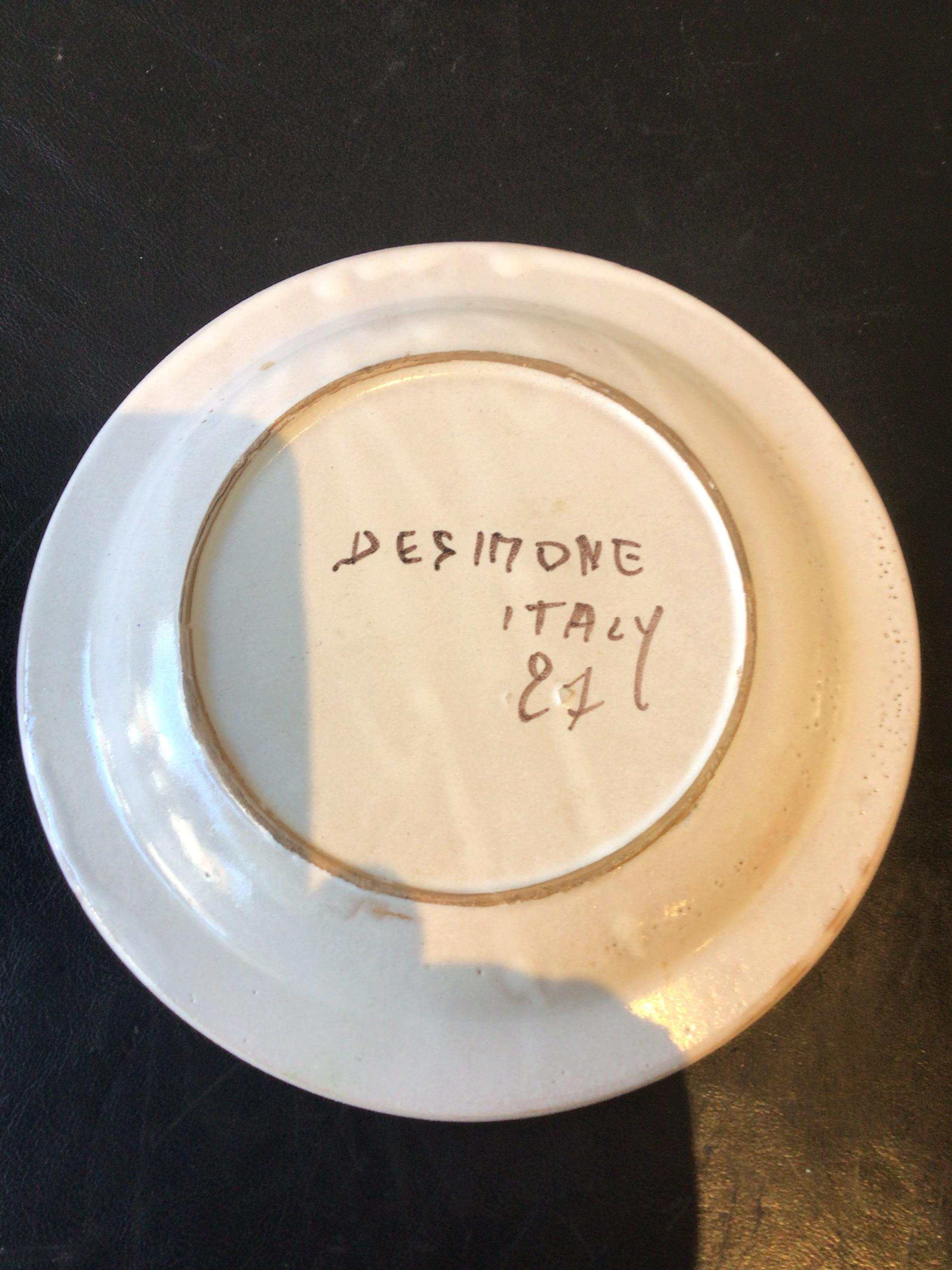 1997 Hand painted plate by DeSimone.