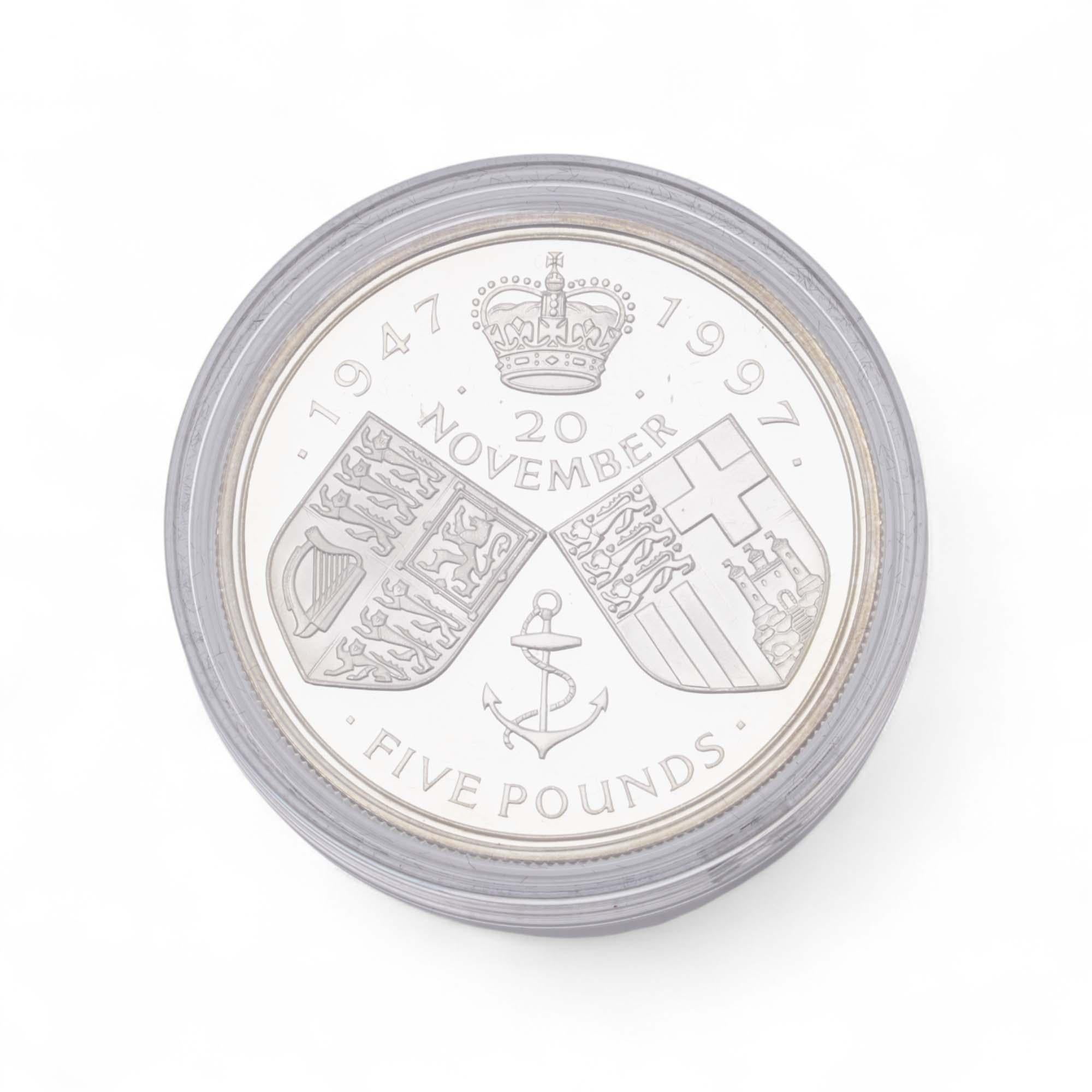 1997 Queen Elizabeth II & Prince Philip Golden Wedding £5 Silver Proof Coin – Original Royal Mint Presentation Box & Certificate

Issued by the Royal Mint in 1997 to commemorate the 50th wedding anniversary of Her Majesty Queen Elizabeth II and His
