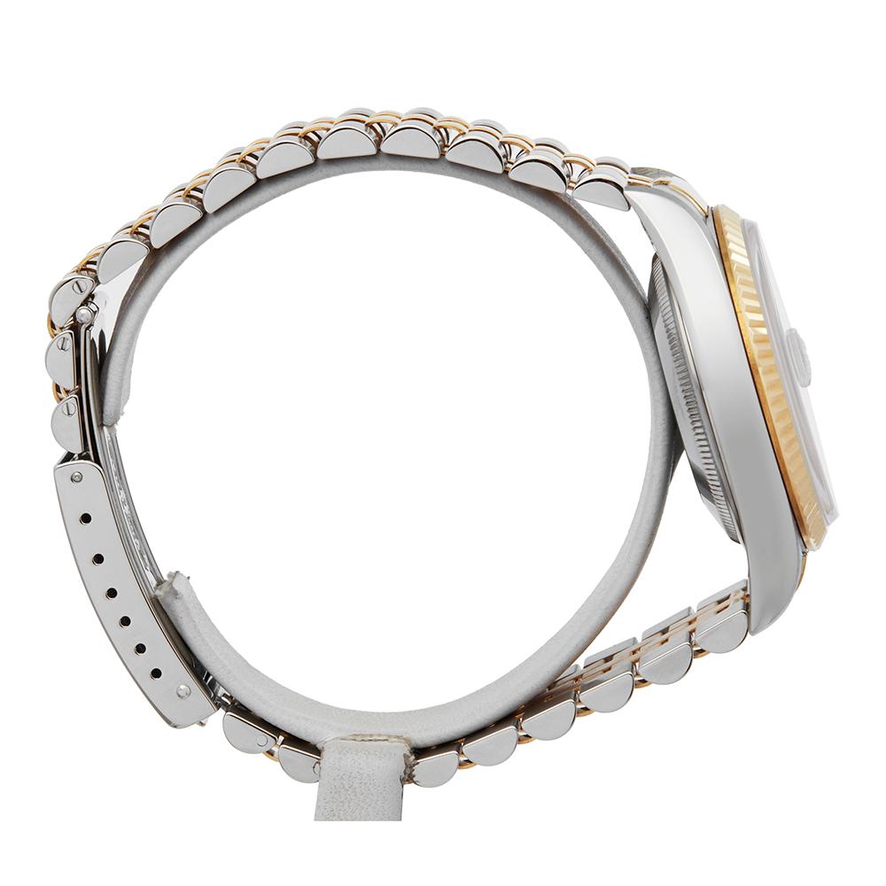 Contemporary 1997 Rolex Datejust Steel & Yellow Gold 16233 Wristwatch
 *
 *Complete with: Presentation Pouch dated 1997
 *Case Size: 36mm
 *Strap: Stainless Steel & 18K Yellow Gold Jubilee
 *Age: 1997
 *Strap length: Adjustable up to 19cm. Please