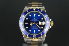Montre-bracelet automatique Rolex Submariner Date en or 18 carats et acier inoxydable, 1997