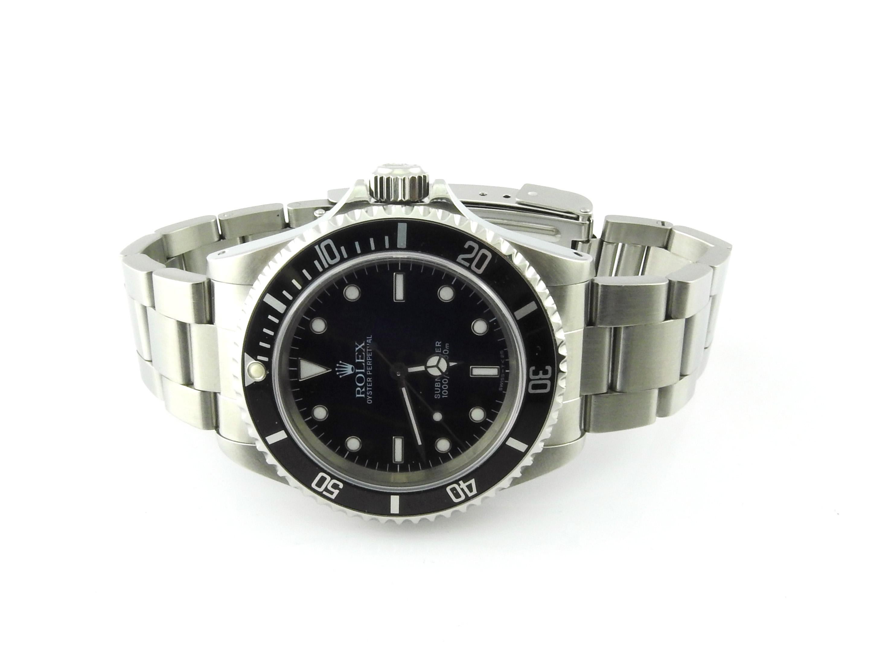 1997 Rolex Submariner Watch

Model: 14060
Serial: U353237

40 mm case

Black Dial , Black Bezel 

No Date

Stainless Steel Oyster Bracelet with flip lock

7.5