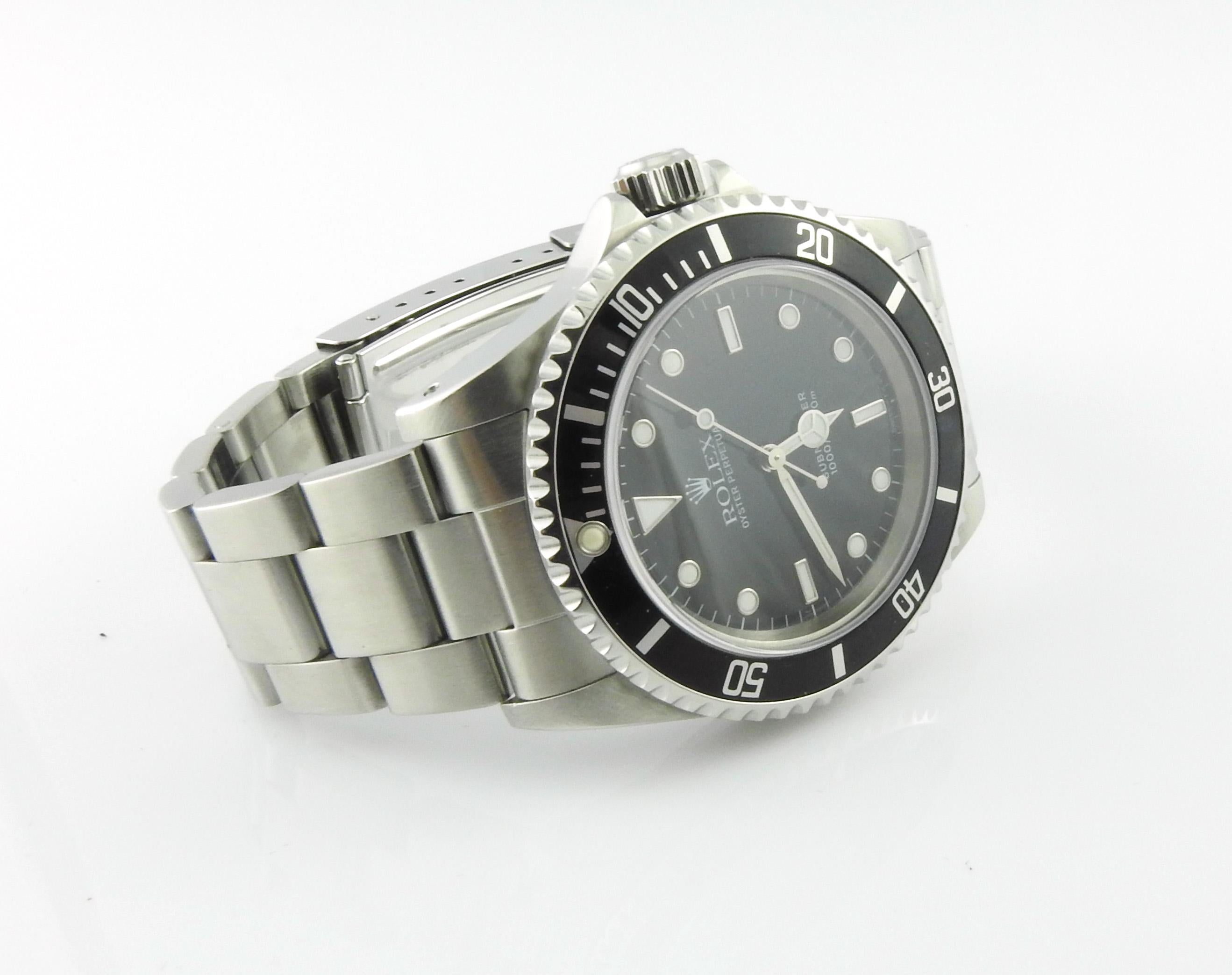 1997 Rolex Submariner Herrenuhr 14060A Schwarzes Zifferblatt schwarze Lünette Box und Papiere 4