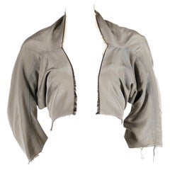 1998 COMME DES GARCONS iridescent grey shrug with raw edges