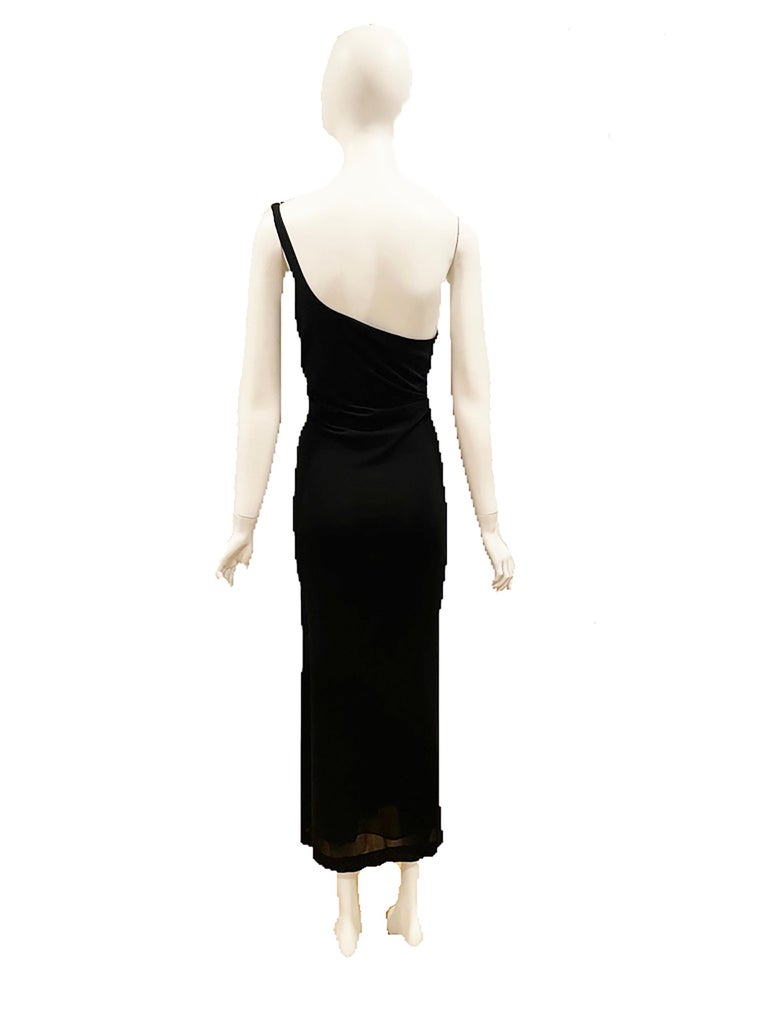 1998 Gucci by Tom Ford Black One Shoulder Crystal G Gown Dress
Condition: Very Good. No holes or stains, no missing crystals.
Rayon & Spandex
Made in Italy
Bust: 32