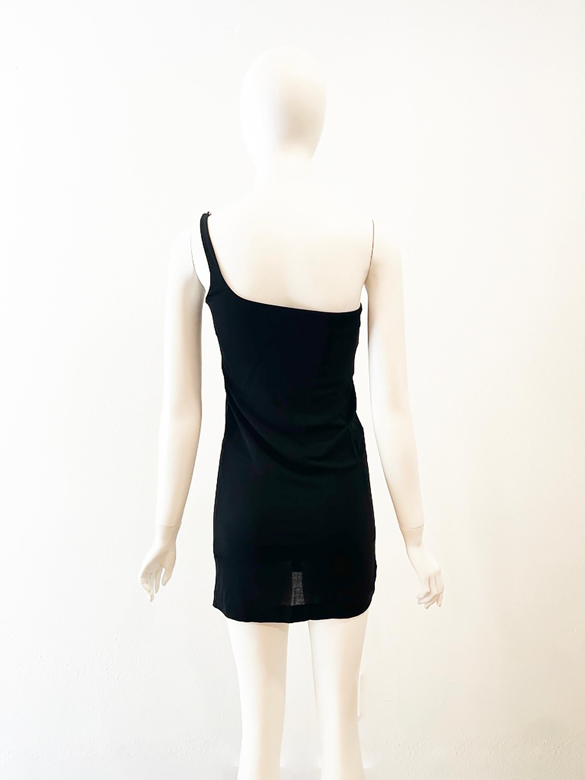 1998 Gucci by Tom Ford Semi-Sheer One Shoulder Stretch Mini Dress
Silver Buckle Embellishment
Condition: Excellent
Rayon & Spandex
Made in Italy 
Bust: 30