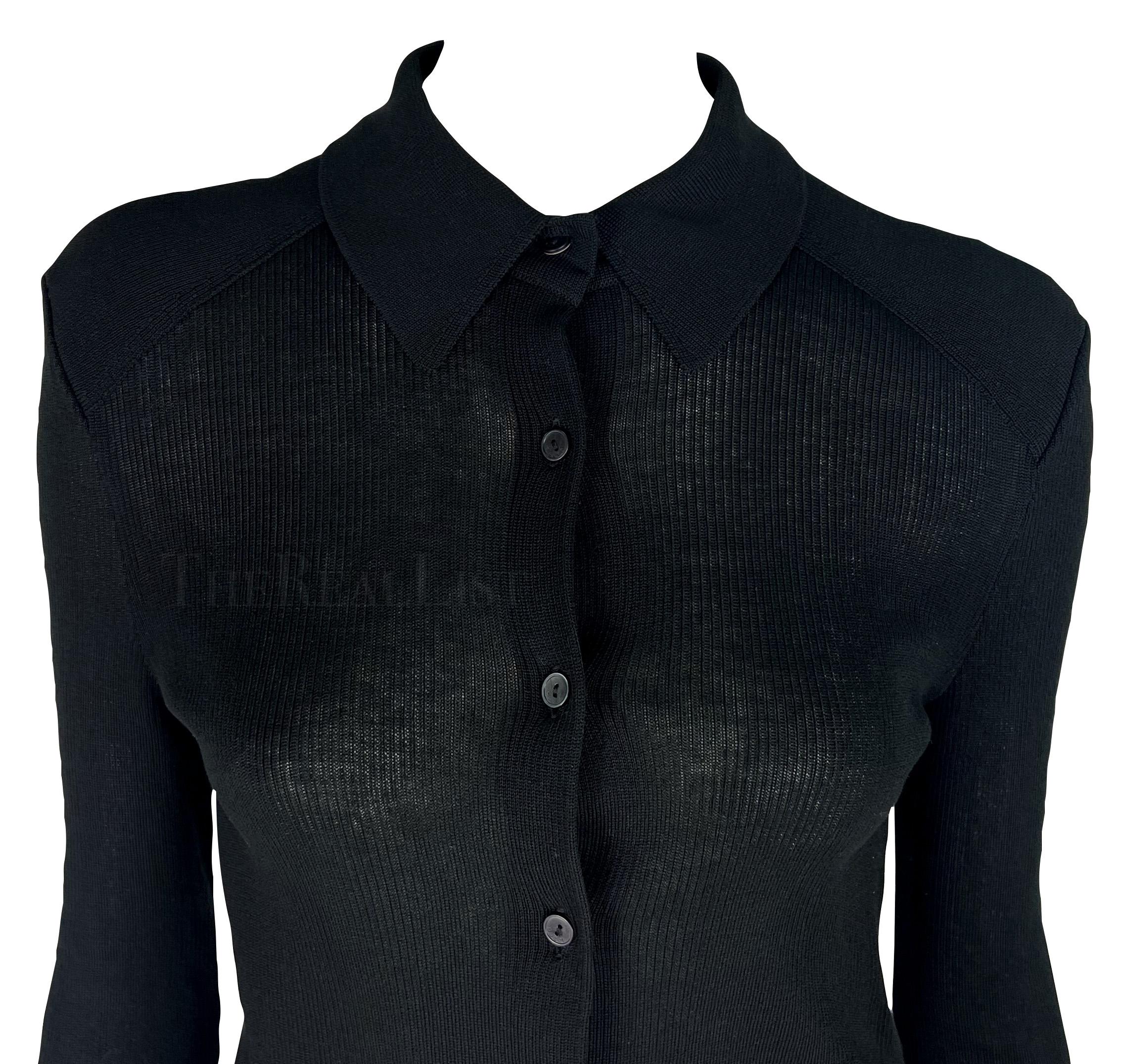 Presenting a fabulous black knit Gucci sweater, designed by Tom Ford. From 1998, this chic semi-sheer black cardigan sweater features a collar and is made complete with a button-down closure. Effortlessly chic, this Gucci by Tom Ford knit top is a