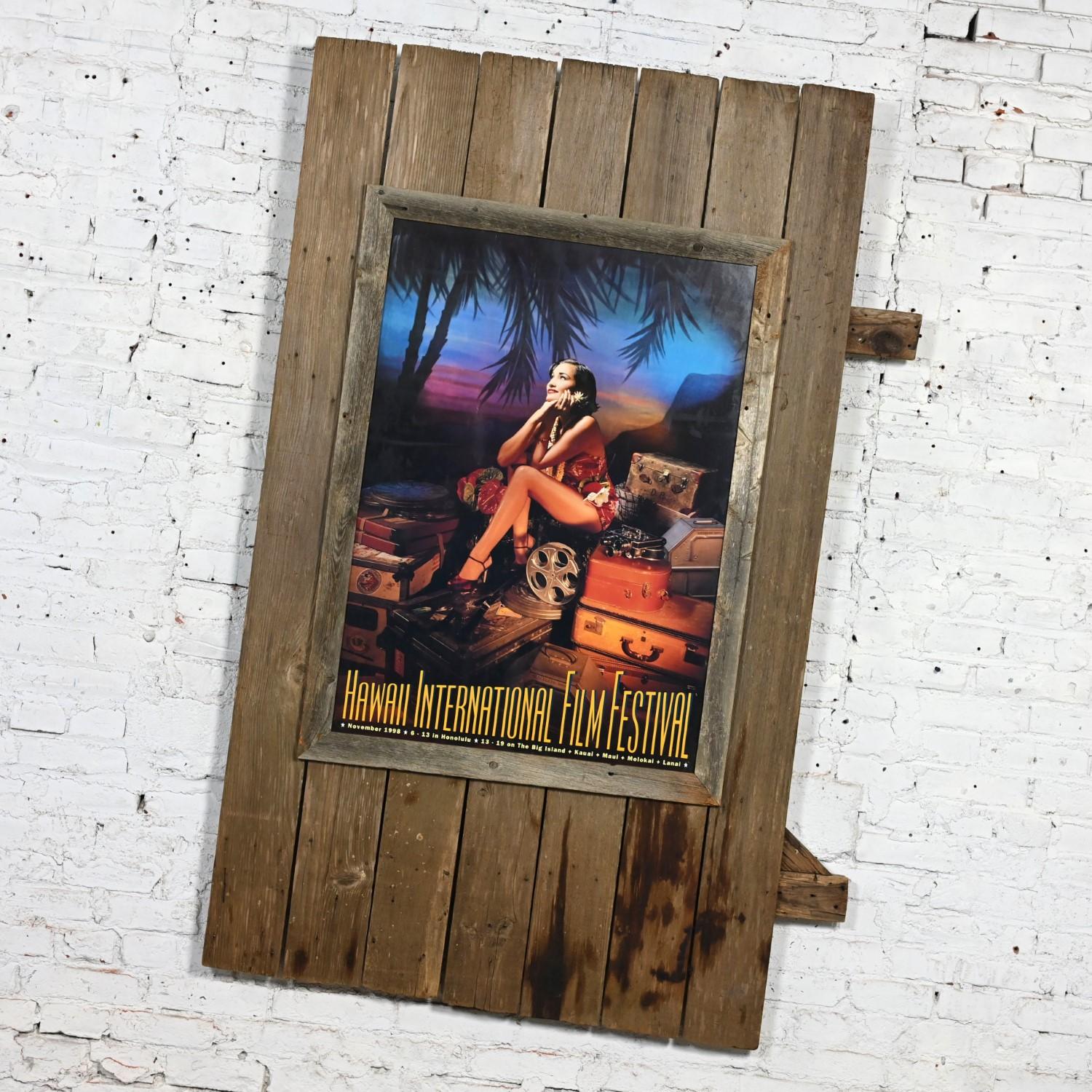 Magnificent vintage Hawaii International Film Festival movie poster on a large-scale Rustic wood mount. Beautiful condition, keeping in mind that this is vintage and not new so will have signs of use and wear even if it has been refinished or